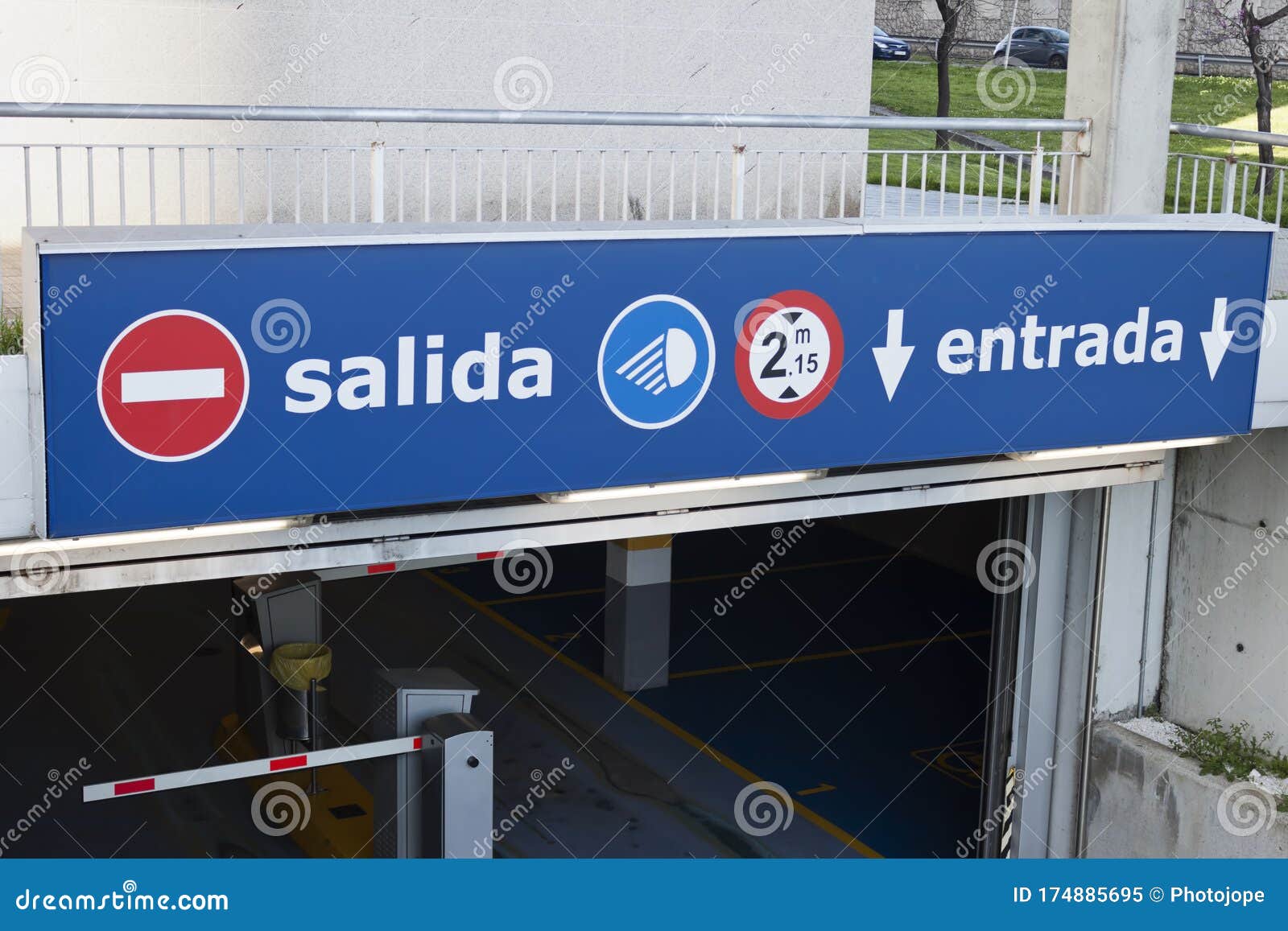 salida, entrada sign at underground parking entrance. exit, entry in spanish