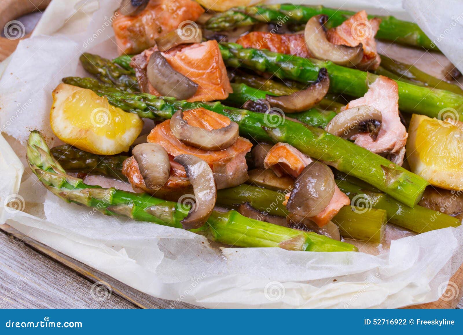 Salmon, Asparagus, and Mushrooms in Parchment Stock Photo - Image of ...