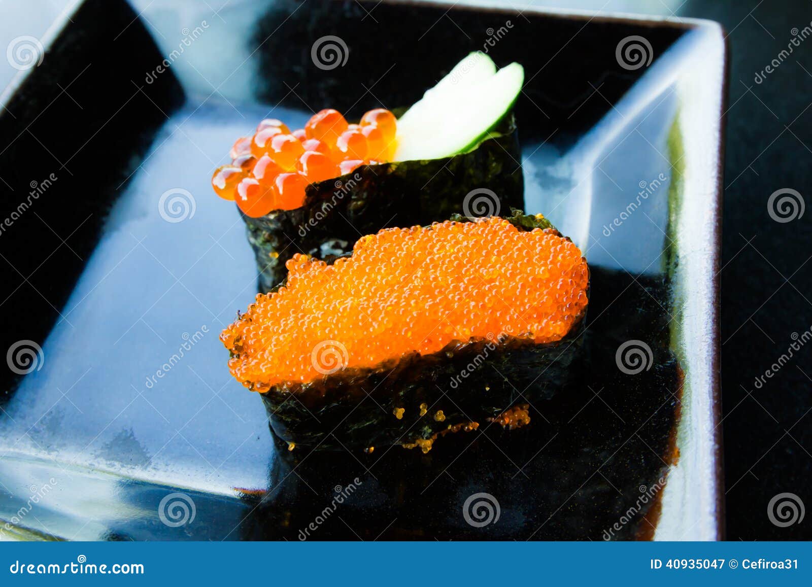 Salmon eggs sushi stock image. Image of isolated, roll 40935047