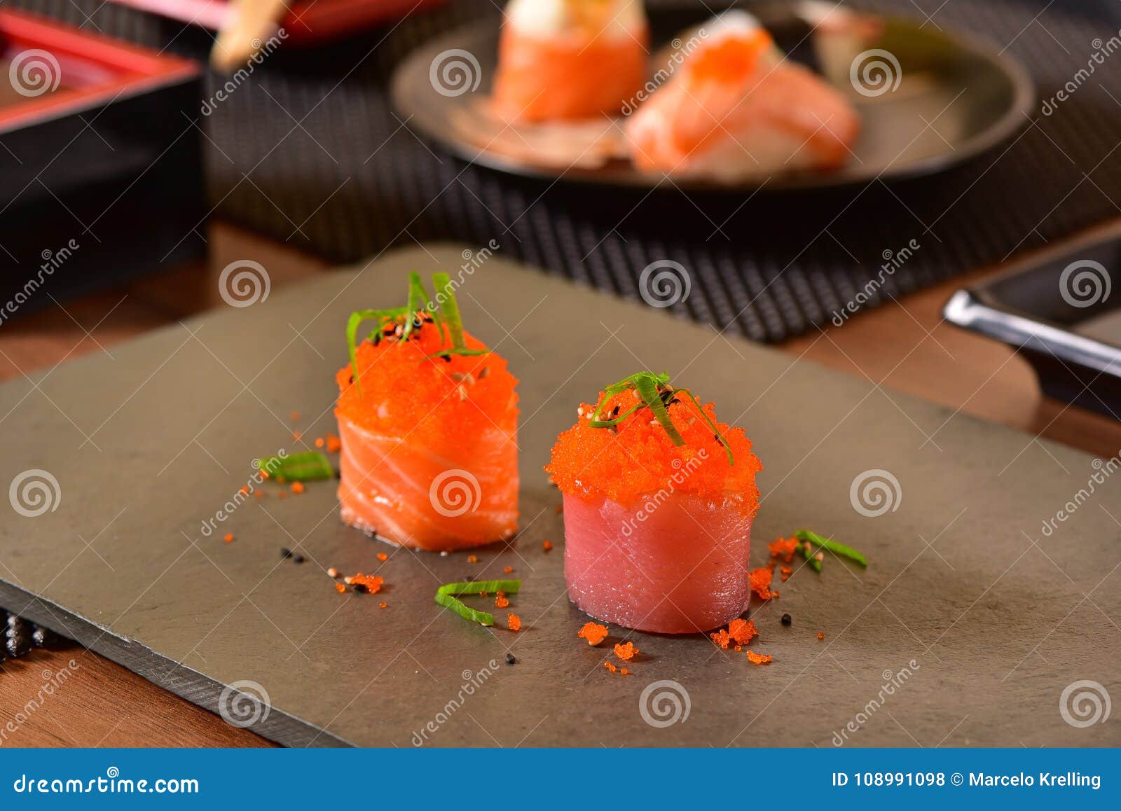 Salmon and fish eggs sushi stock photo. Image of dinner 108991098