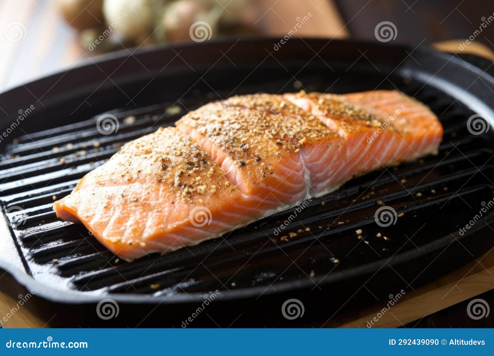 A Salmon Steak with Grill Marks on a Nonstick Pan Stock Photo Image