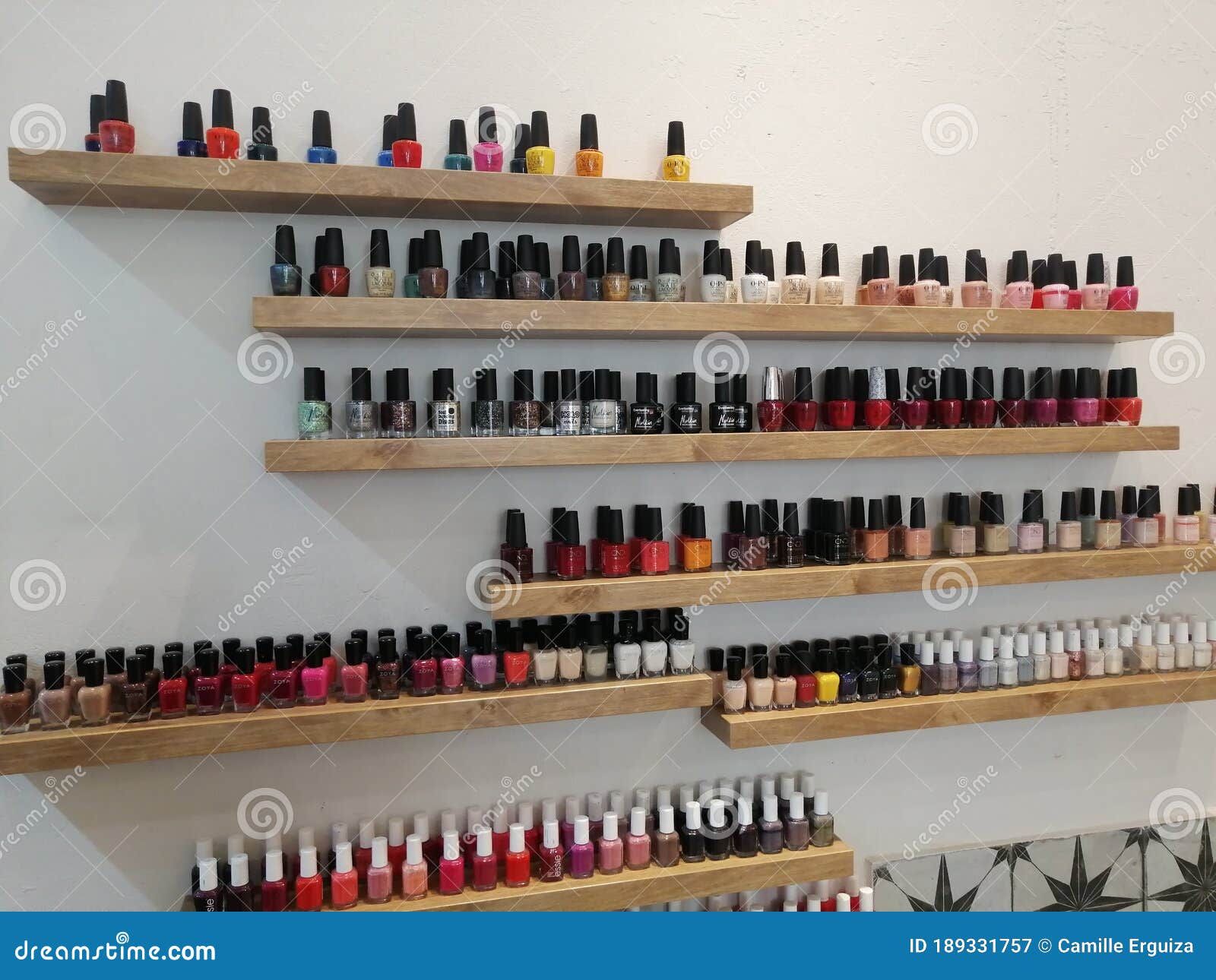 Salon nail polish display stock image. Image of shelf 189331757