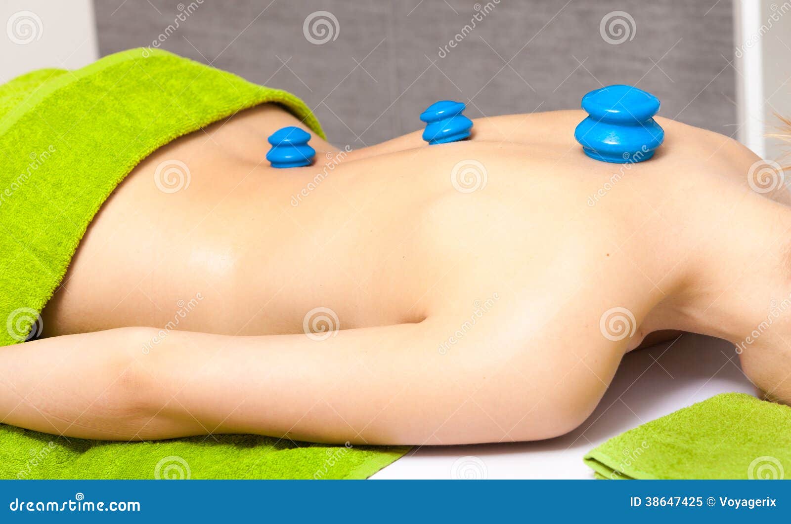 salon. woman getting spa cupping vacuum massage
