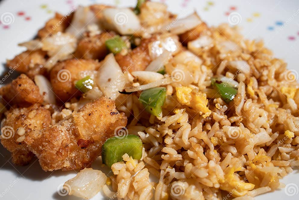 Salt and Chilli Chicken with Egg Fried Rice Chinese Takeaway Stock