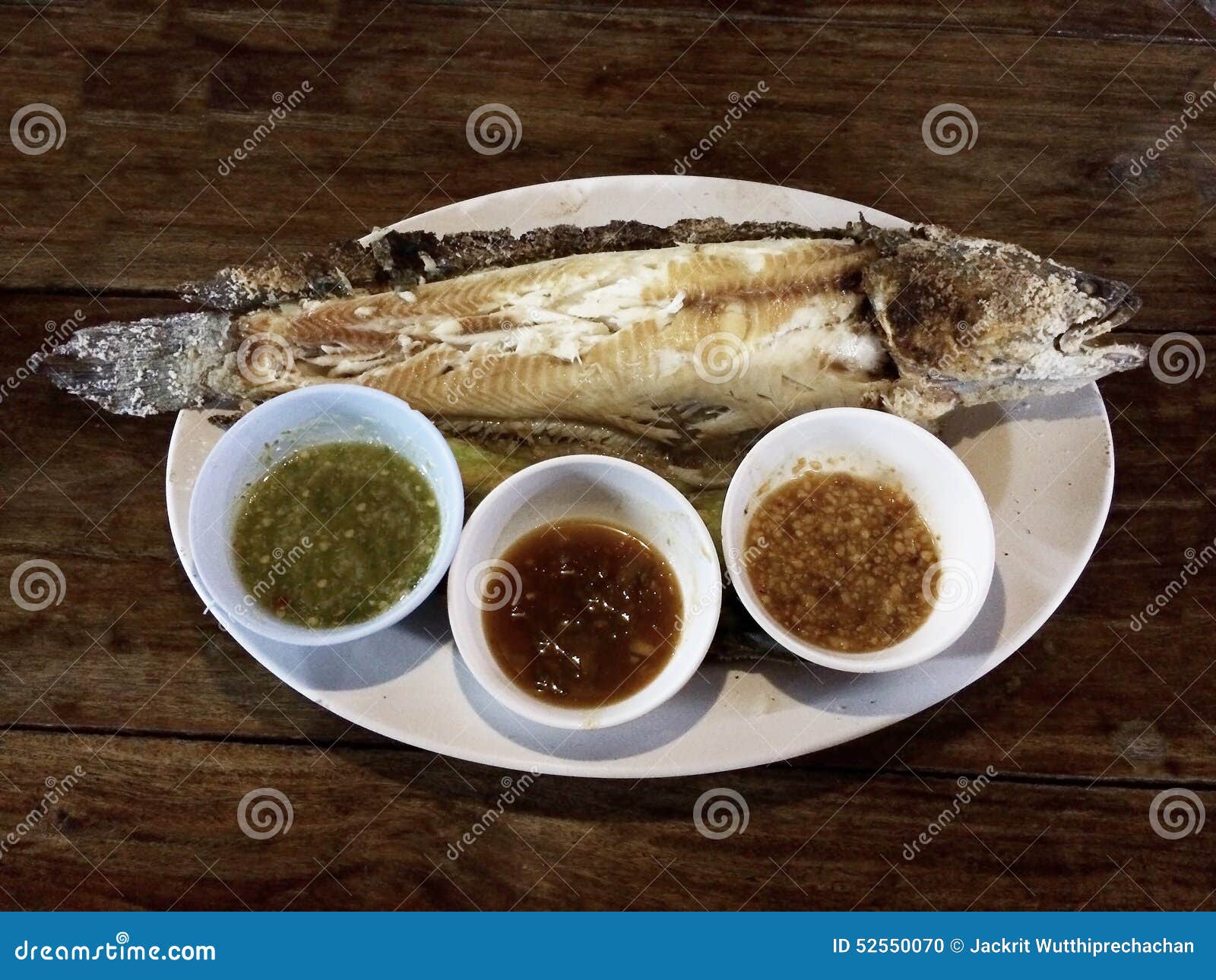 Salt Crusted Grill Fish with Three Thai Style Sauce Stock Photo Image