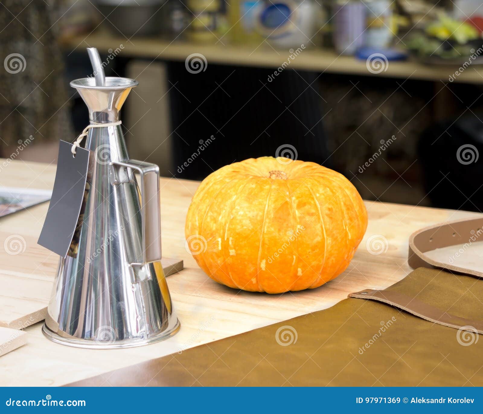 Salt Grinders on a Wooden Background with an Orange. Stock Image