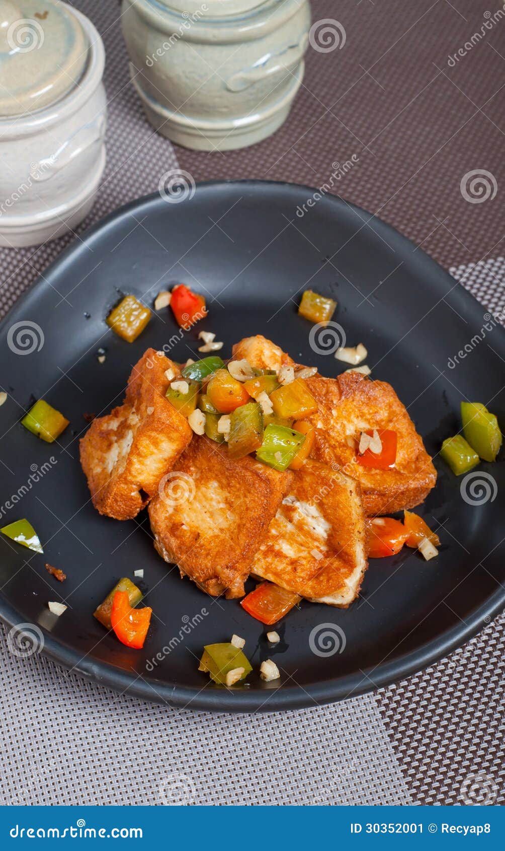 Salt and pepper fried tofu stock image. Image of herb 30352001