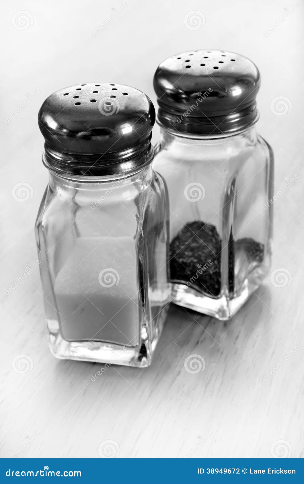 Salt and Pepper Shakers on Table Top Stock Photo Image of glass