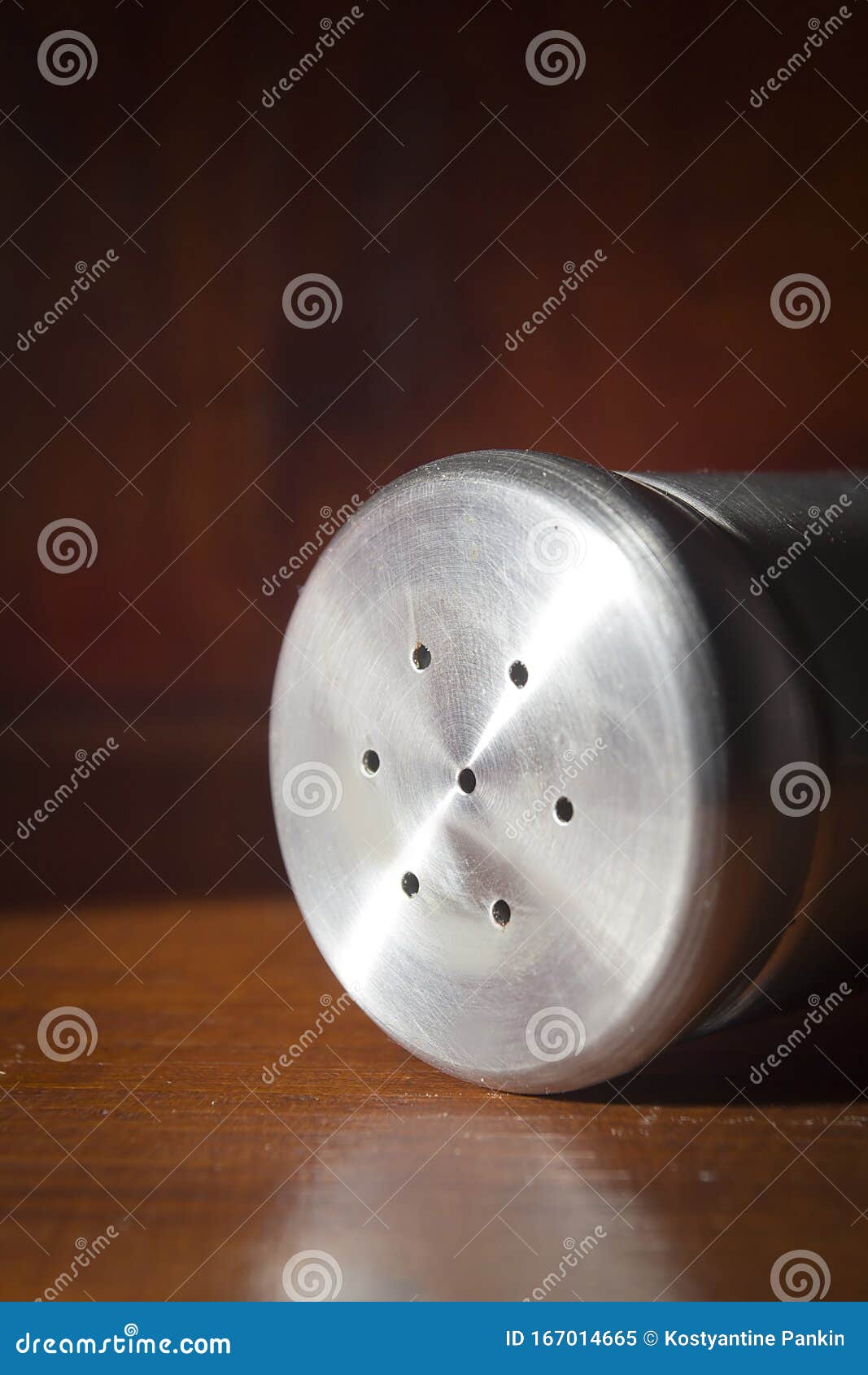 Salt shaker on the table stock image. Image of crystals 167014665