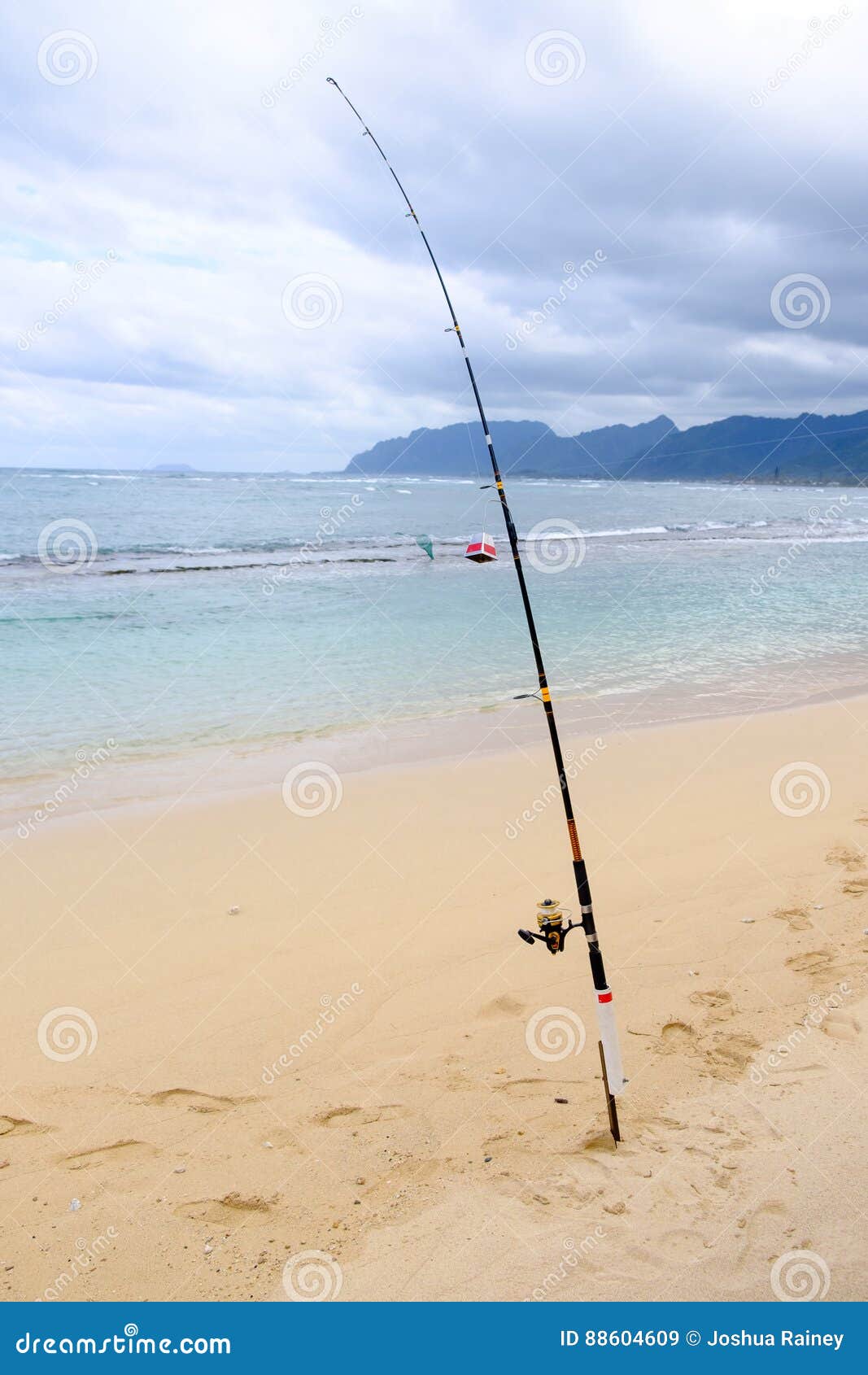 Saltwater Fishing Pole and Ocean Stock Image - Image of fisherman