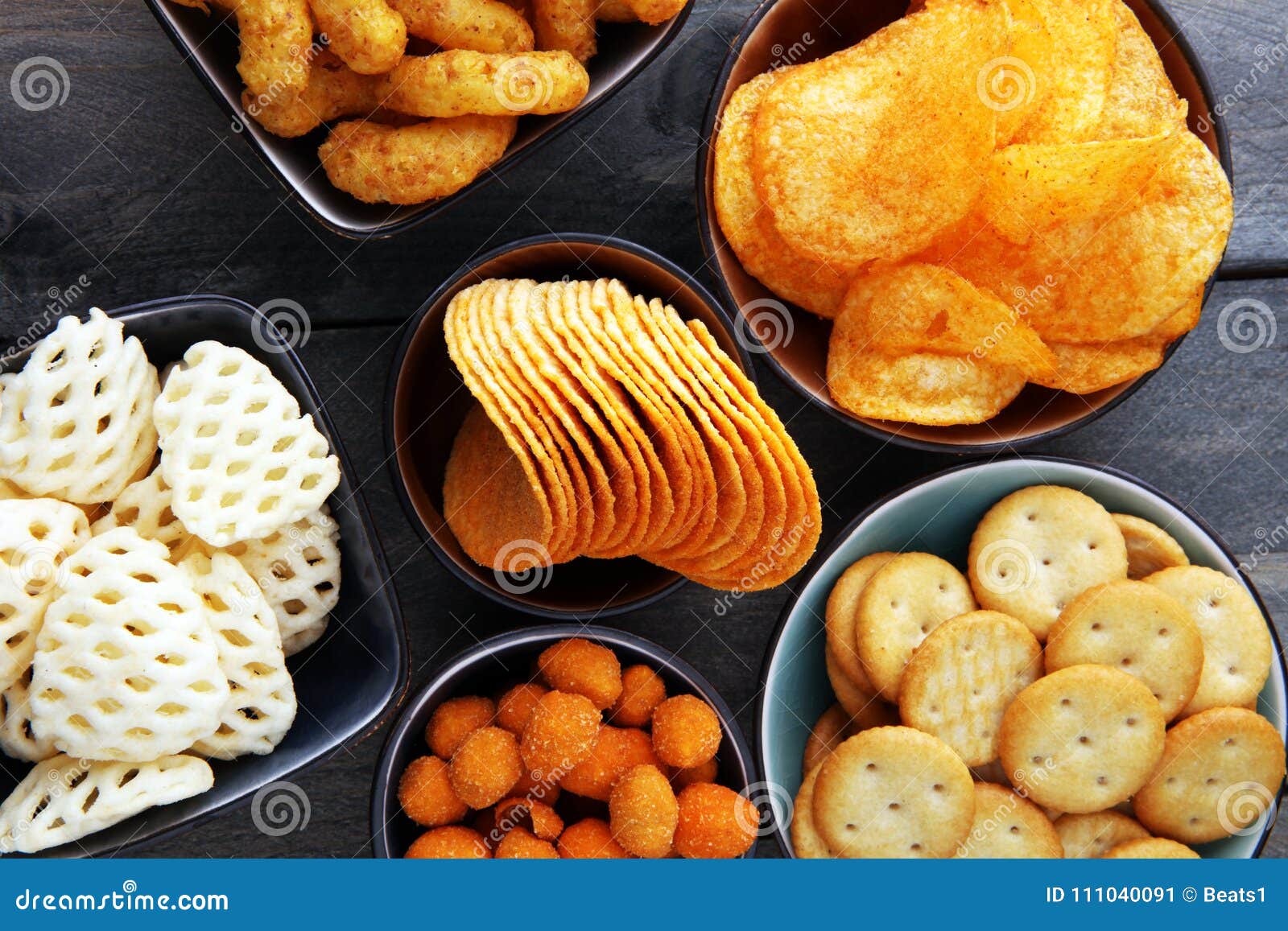 Salty Snacks. Pretzels, Chips, Crackers in Bowls. Stock Image Image