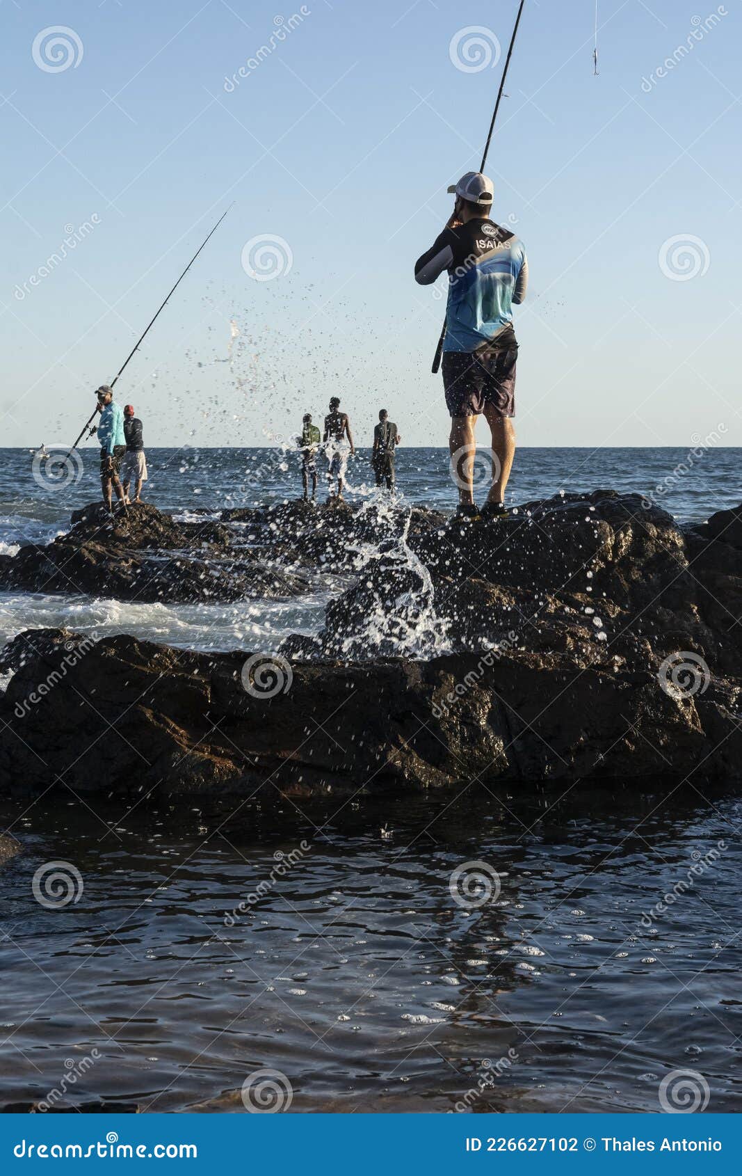 Fishermen on Rocks with Their Fishing Poles Trying To Catch Fish To Sell  and Consume Editorial Photography - Image of sell, outdoors: 226627102