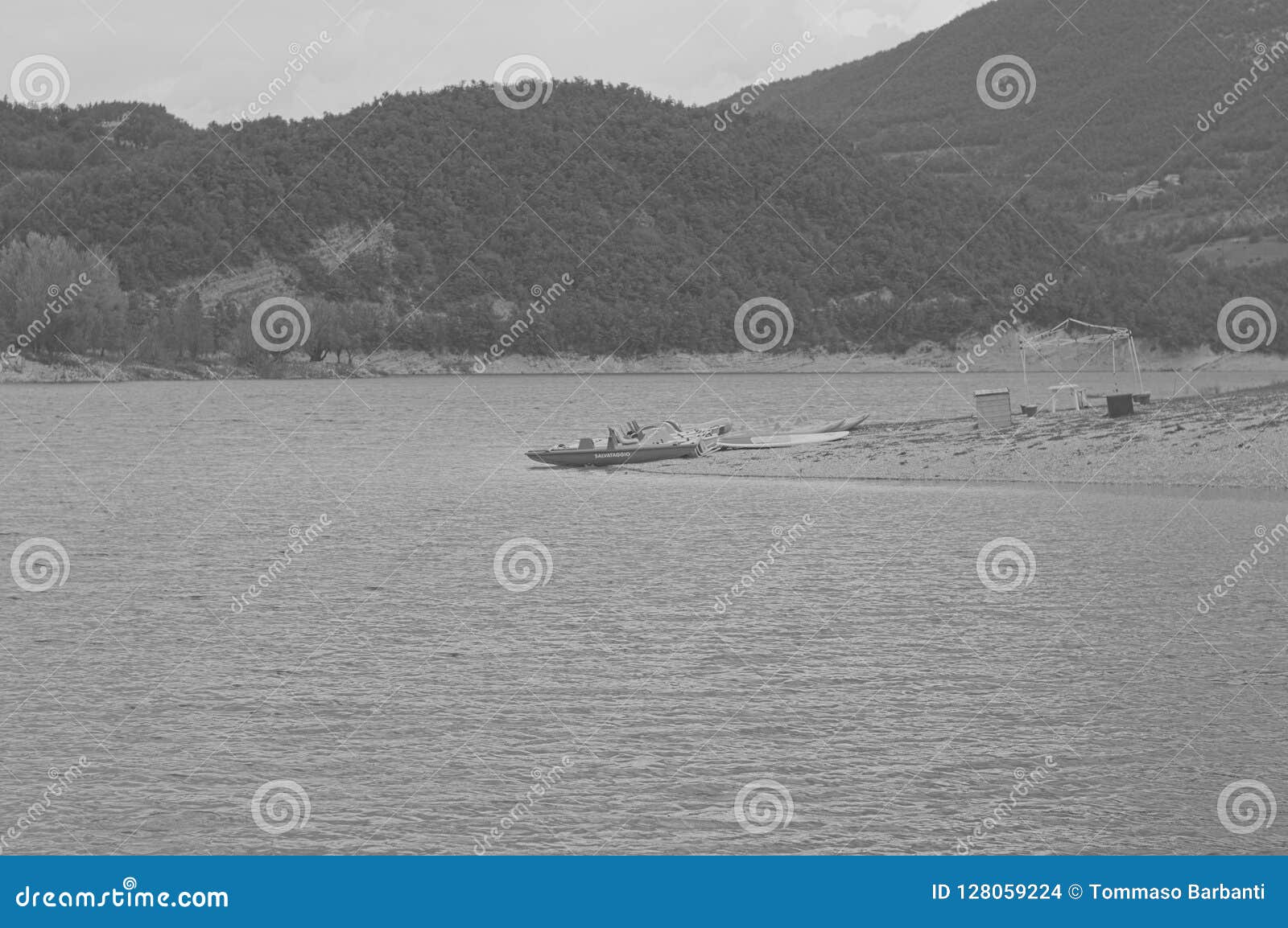 `salvataggio` boat means rescue boat in the lake - fiastra lake