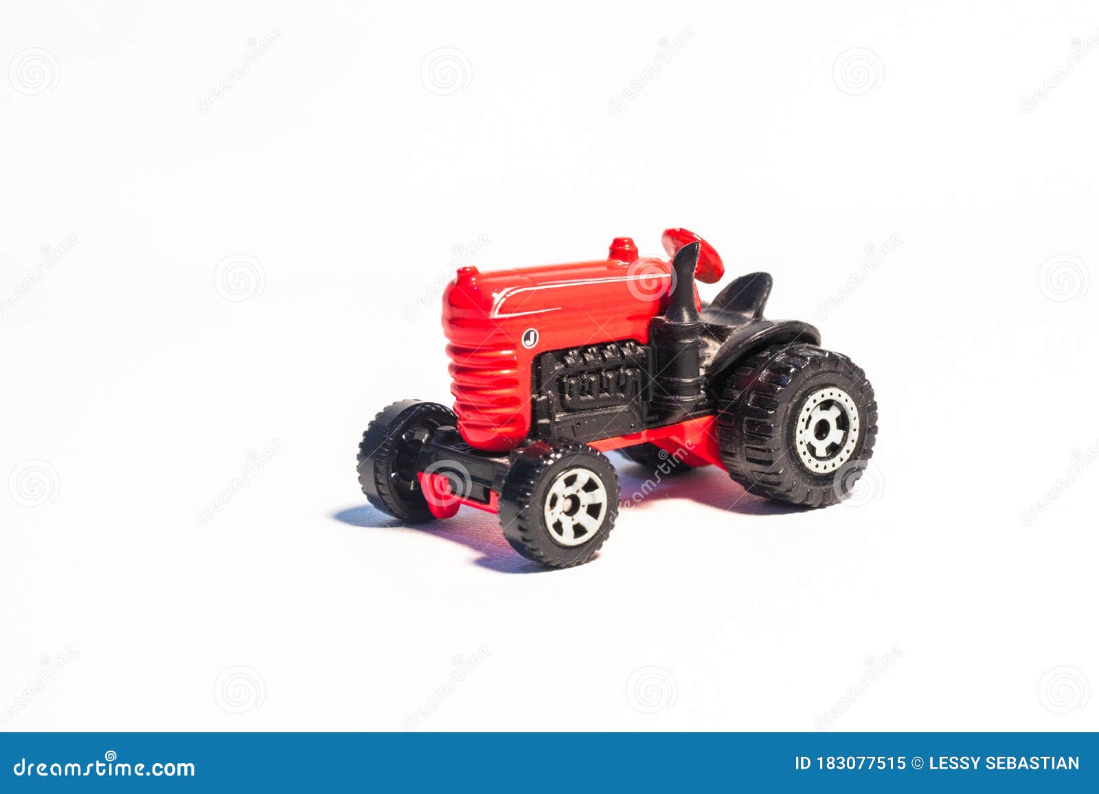 Red tractor of toys stock image. Image of transportation 183077515