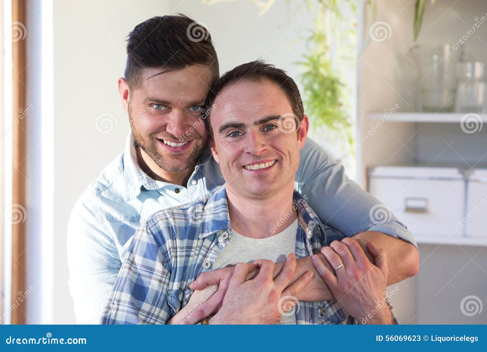 Same sex couple at home stock image image