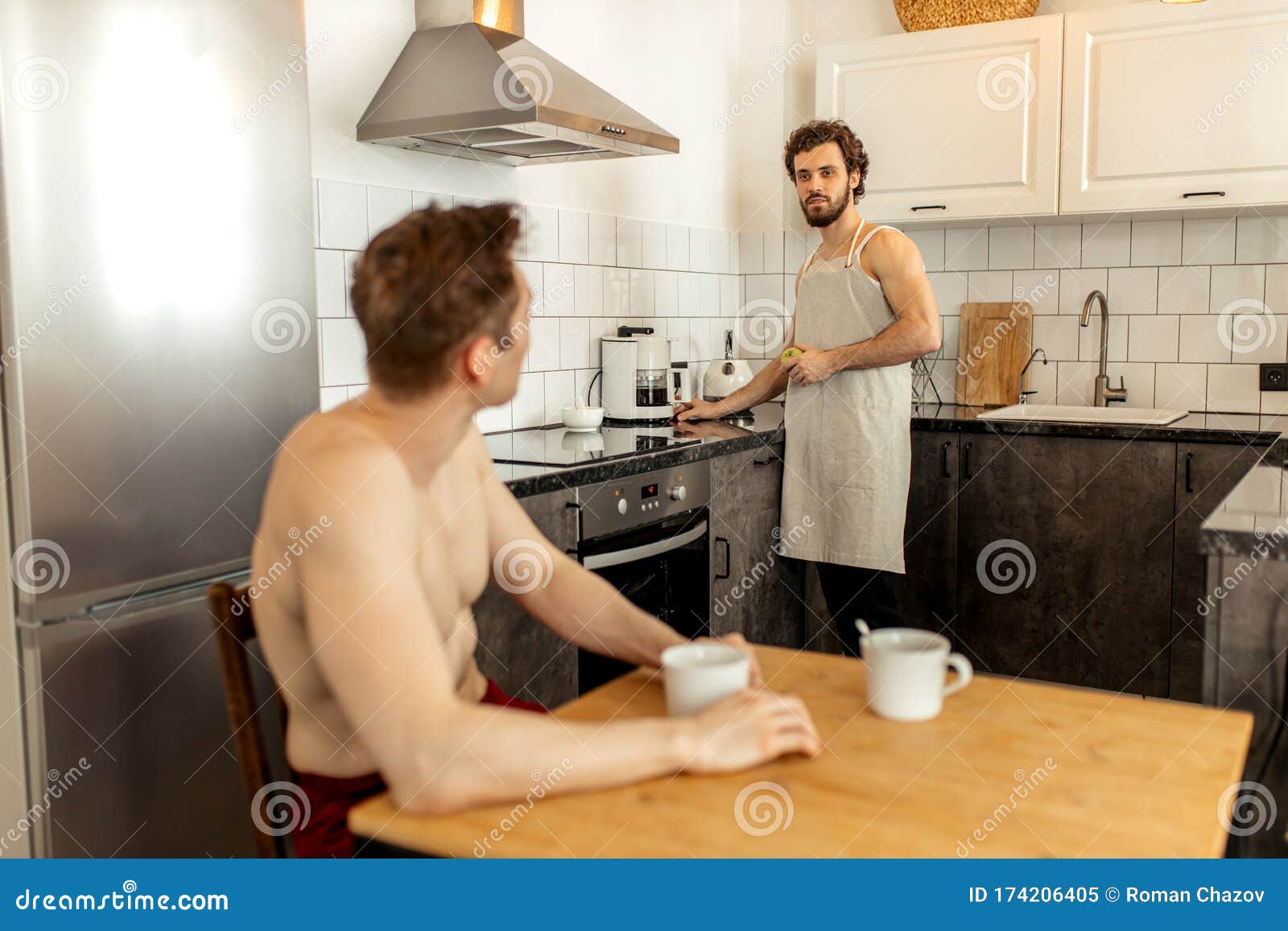 standing sex in kitchen