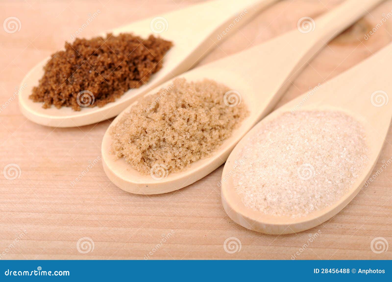 Sample of Dark Brown, Brown, and White Cane Sugar Stock Photo Image