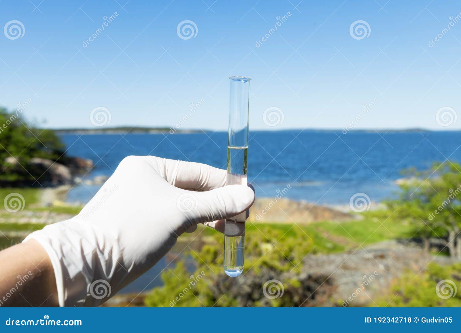sample water from the sea for analysis. sea on background