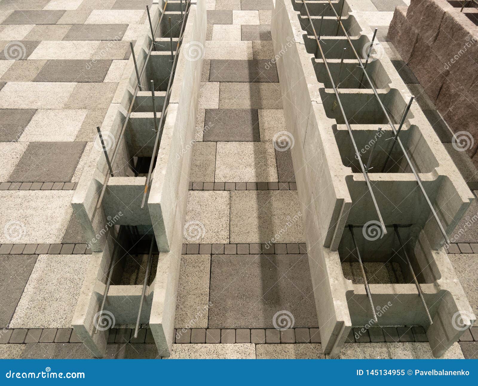 Samples of Armored Concrete and Foamed Concrete Blocks Bricks for