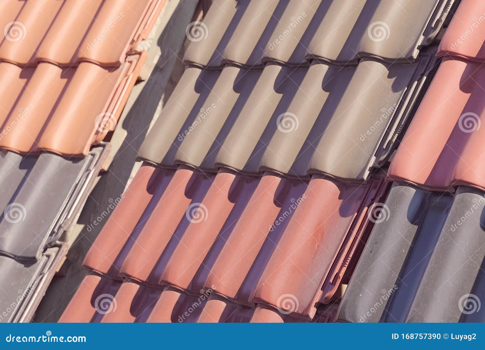 Samples of Ceramic Roofing Tiles in a Warehouse of a Roofing Mat Stock