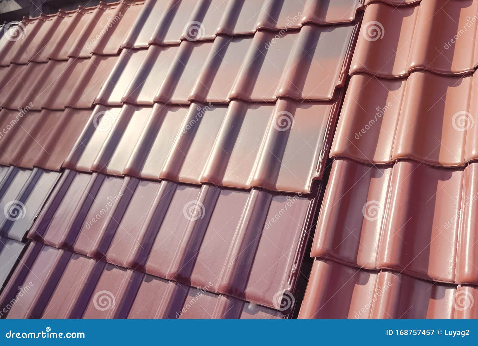Samples of Ceramic Roofing Tiles in a Warehouse of a Roofing Mat Stock
