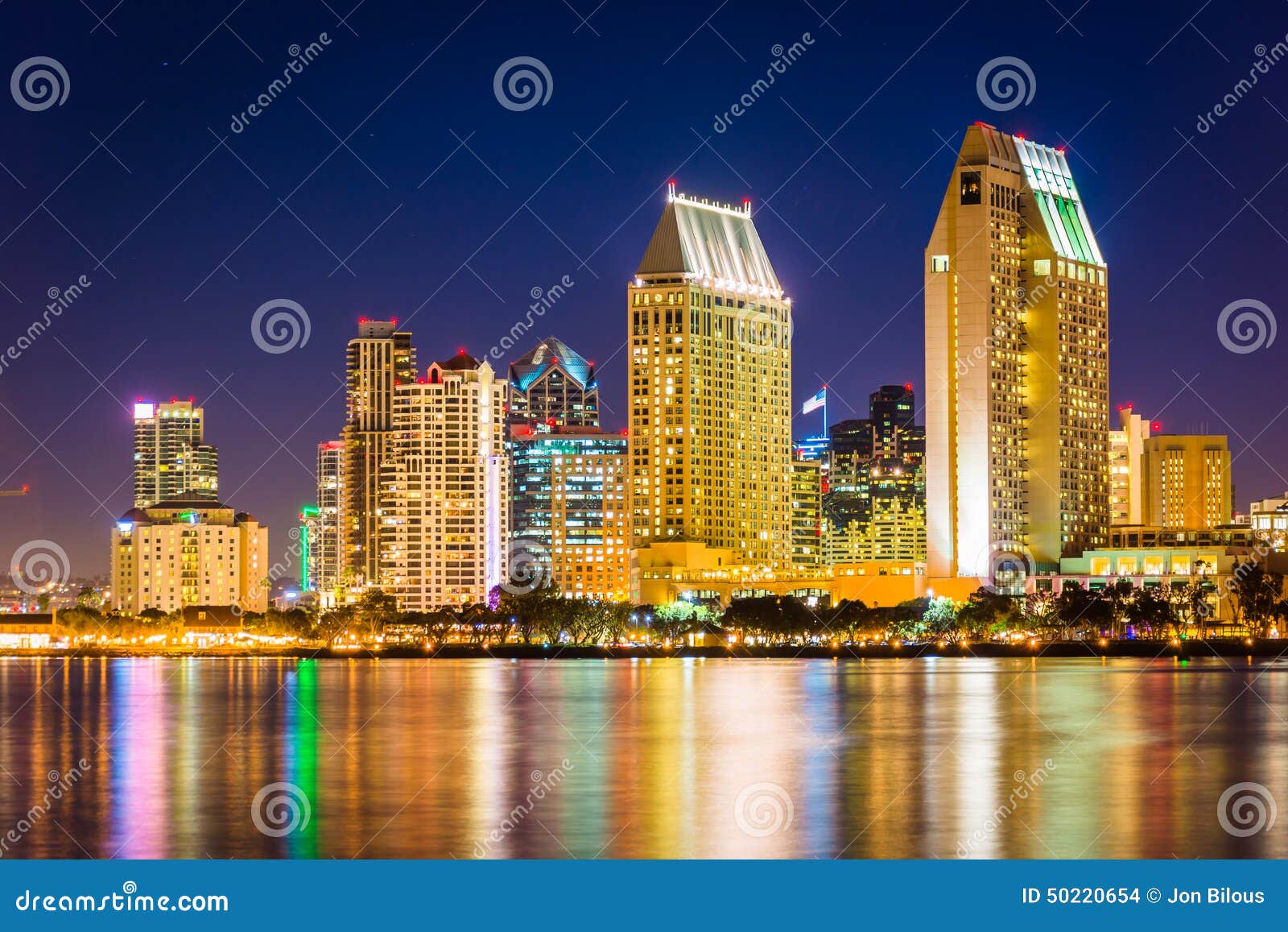 the san diego skyline at night, seen from centennial park, in co