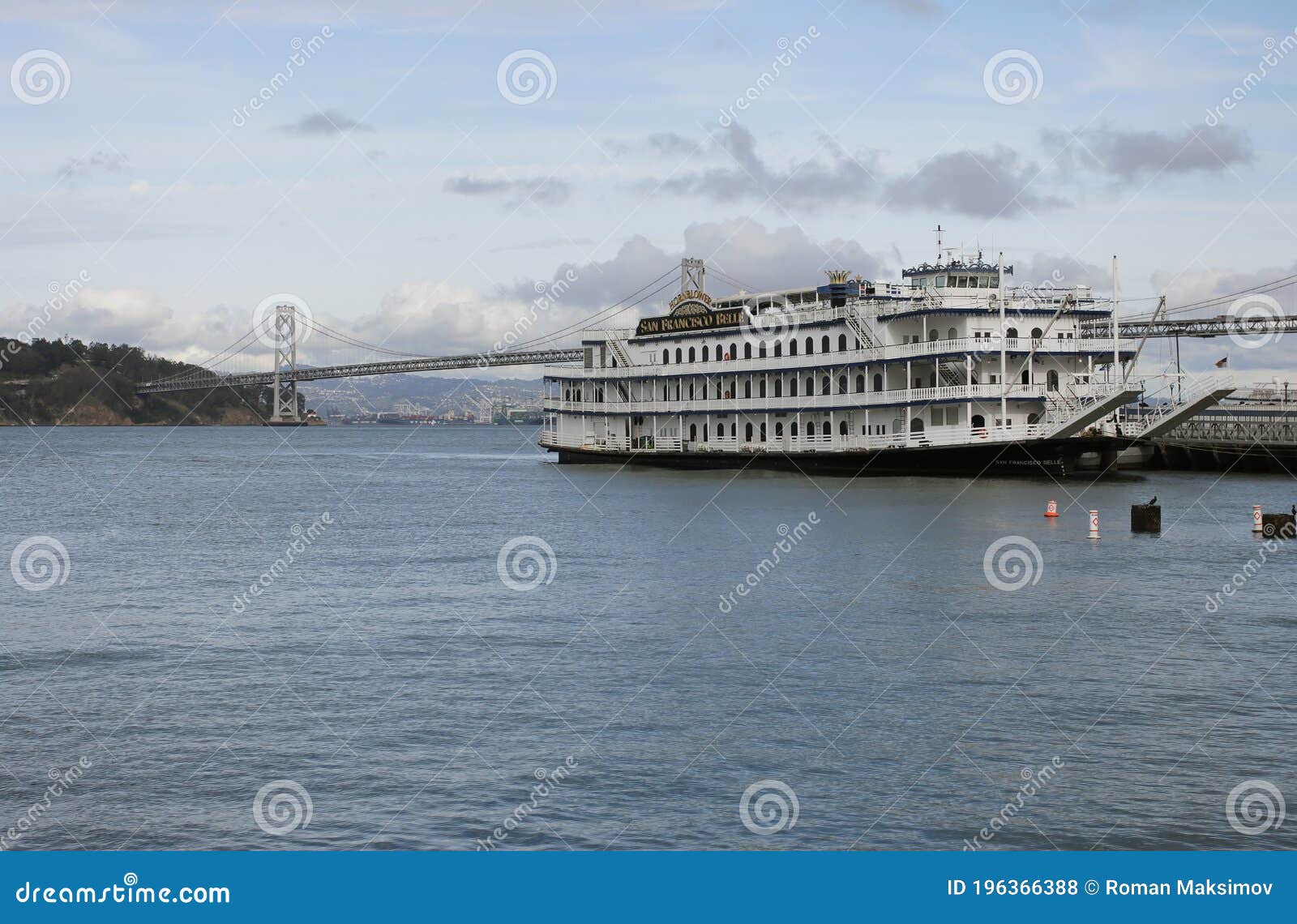 San Francisco Belle Ship and Oakland Bay Bridge Editorial Stock Photo