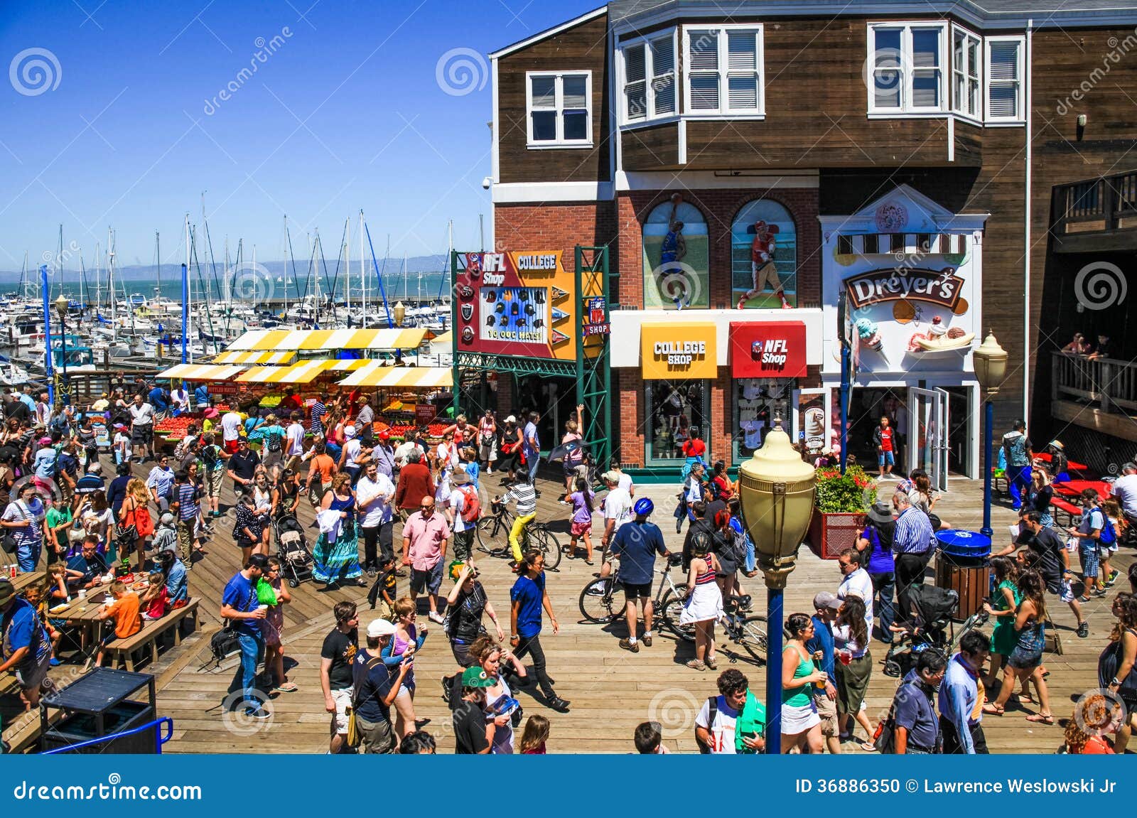 Tourists on Fisherman`s Wharf, Pier 39 at Carousel Editorial Stock