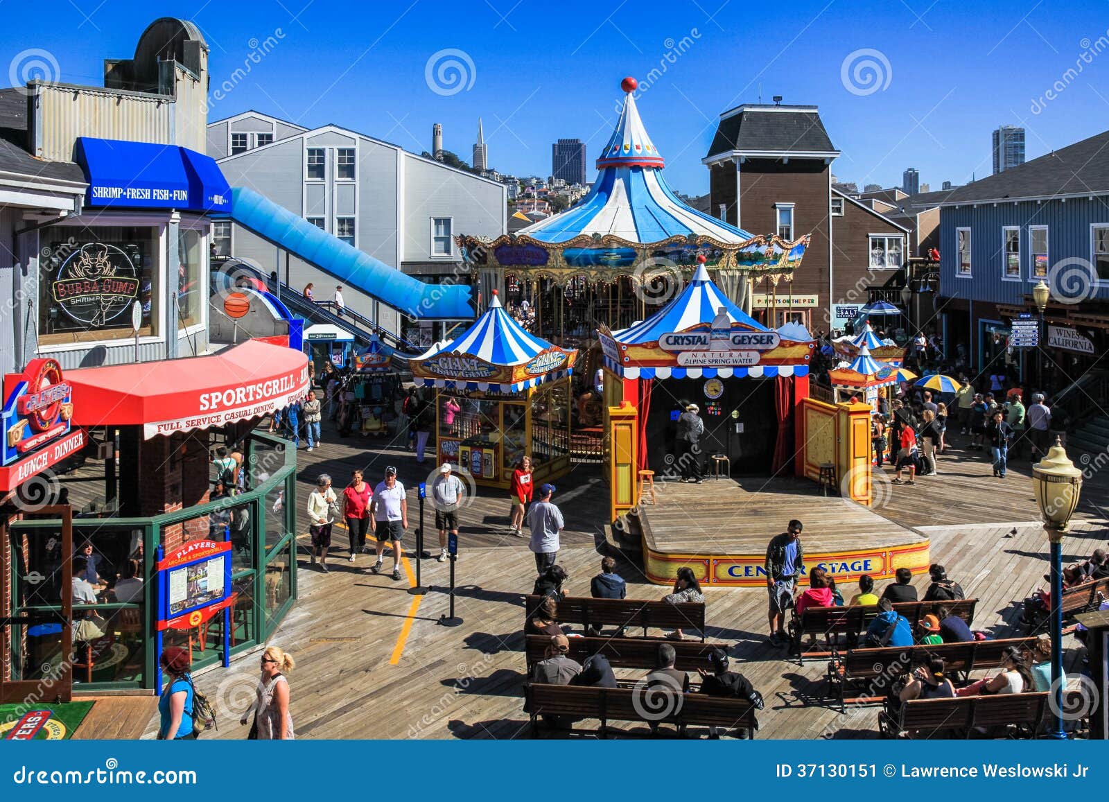 Tourists on Fisherman`s Wharf, Pier 39 at Carousel Editorial Stock