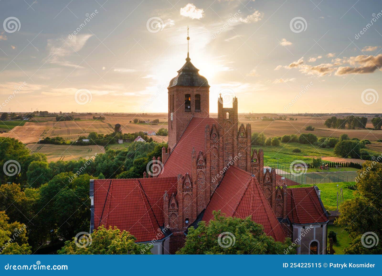sanctuary in piaseczno illuminated by the setting sun, poland