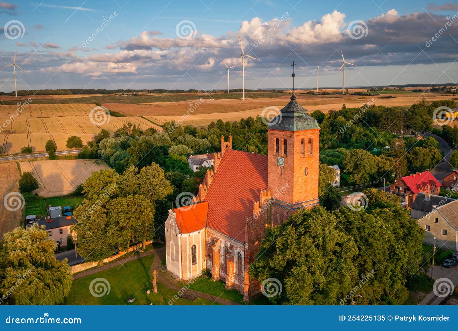 sanctuary in piaseczno illuminated by the setting sun, poland