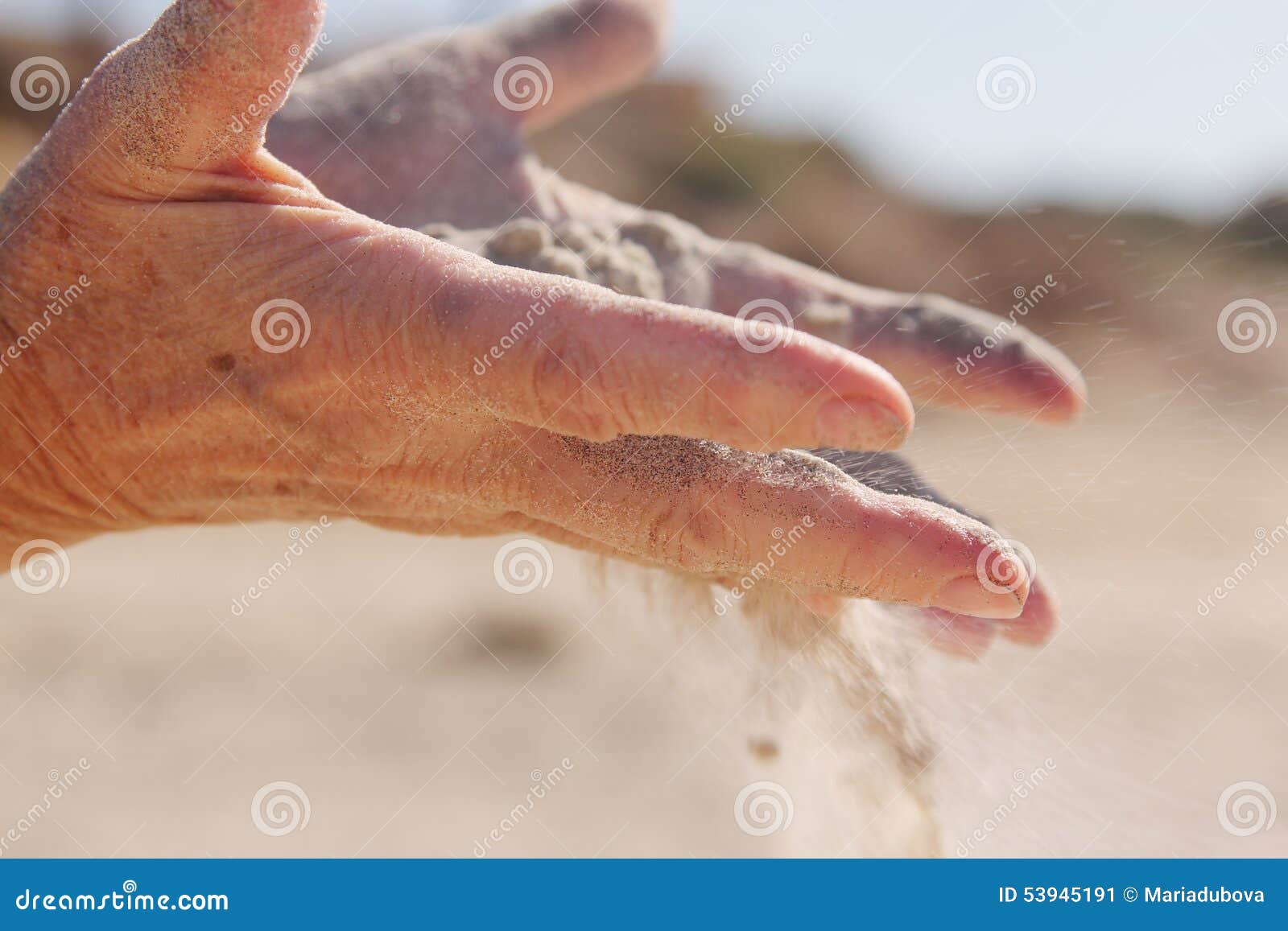Sand in hands stock image. Image of warm, beach, fade 53945191