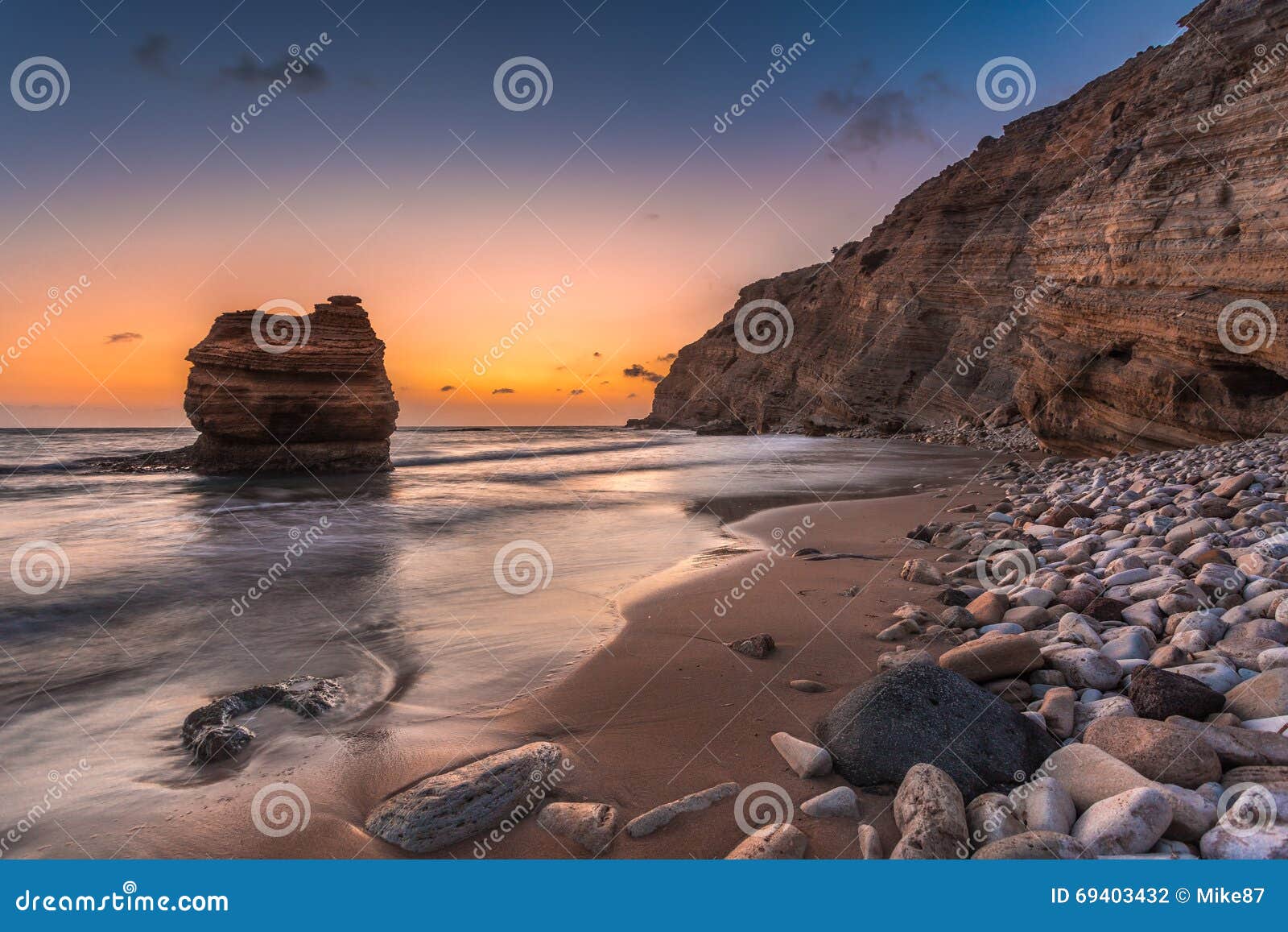 sand and pebble beach at cavo paradiso in kefalos, kos island, greece.