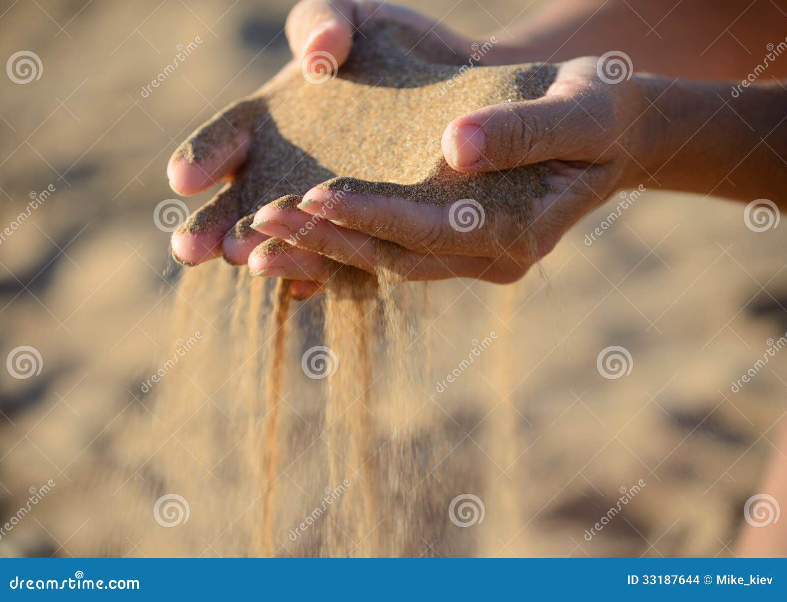 sand pours out of the hands