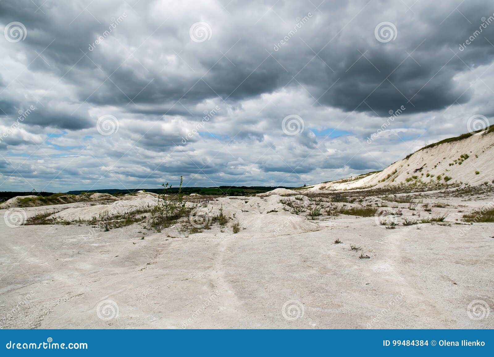 Sand quarry and cloudy sky stock photo. Image of clay 99484384