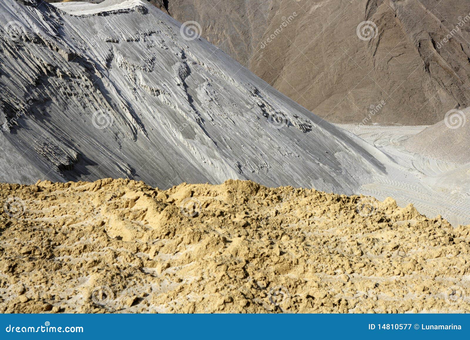 sand quarry mounds of varied sands color