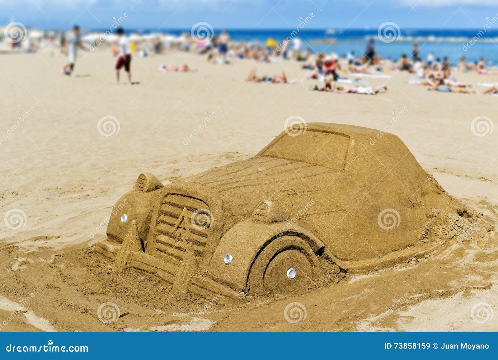 sand sculpture at la barceloneta beach, in barcelona, spain