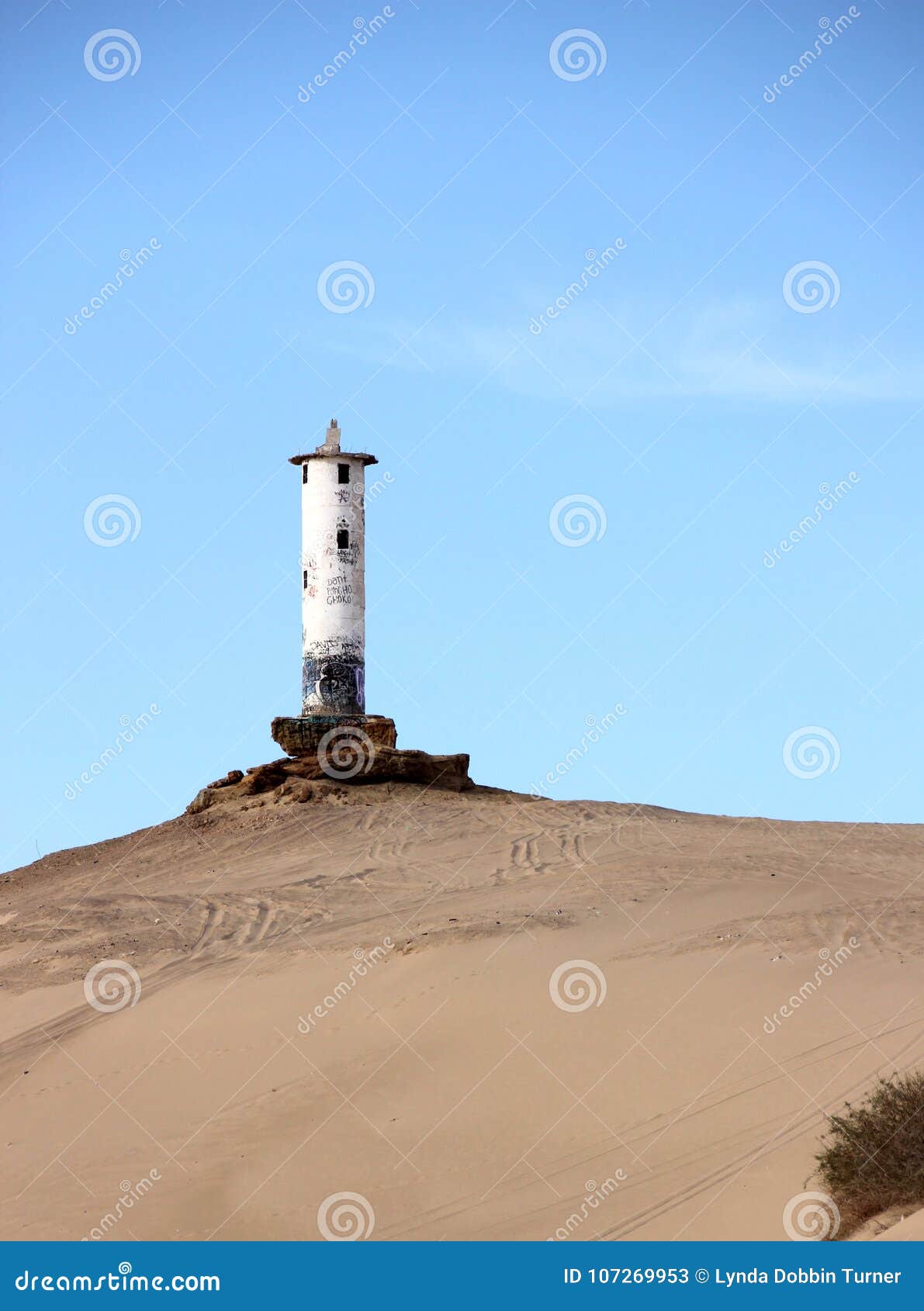 crumbling lighthouse ruins on shoreline of sea of cortez near el golfo de santa clara, sonora, mexico