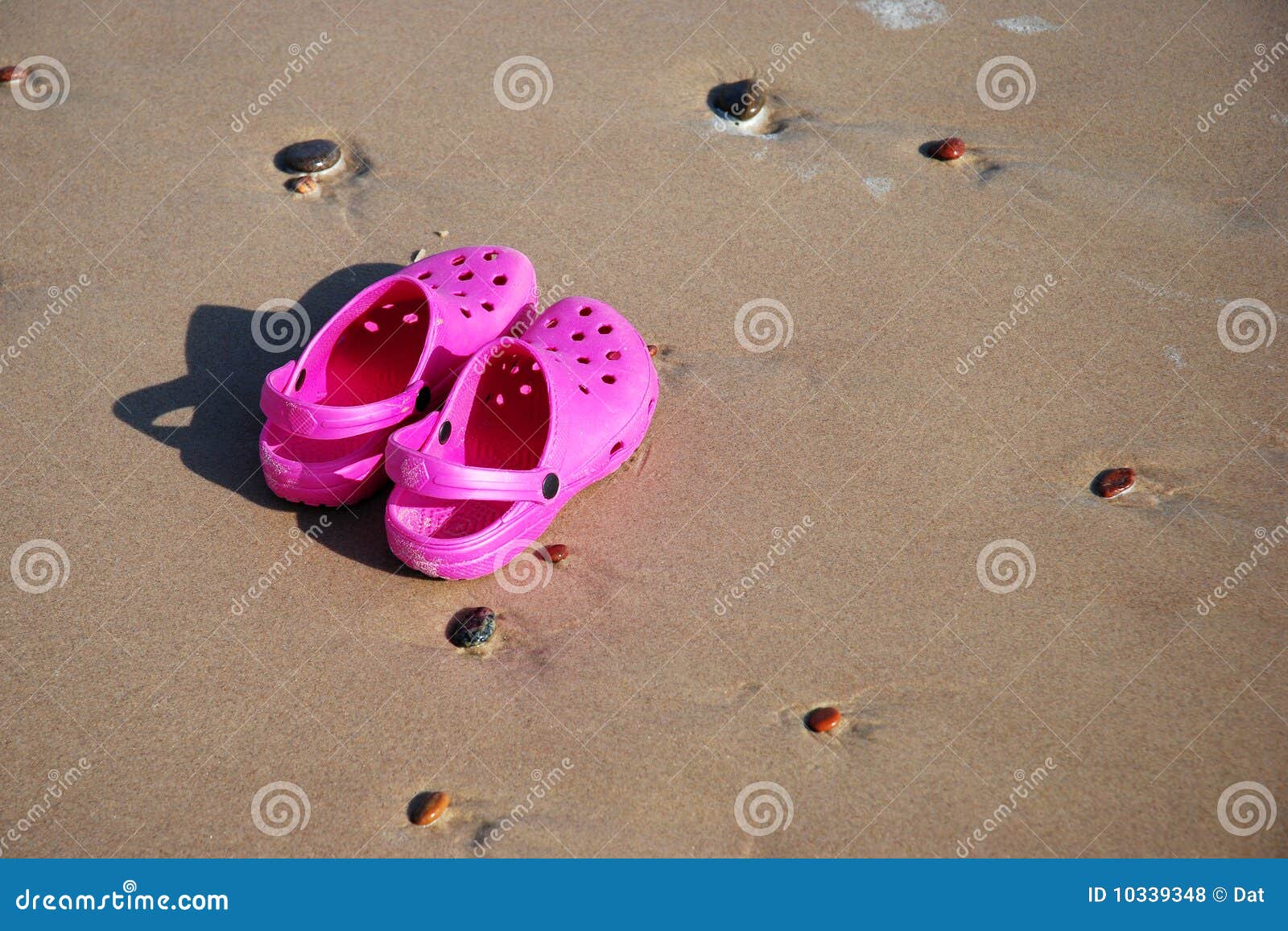 Sand shoes stock photo. Image of onshore, stones, tropical 10339348