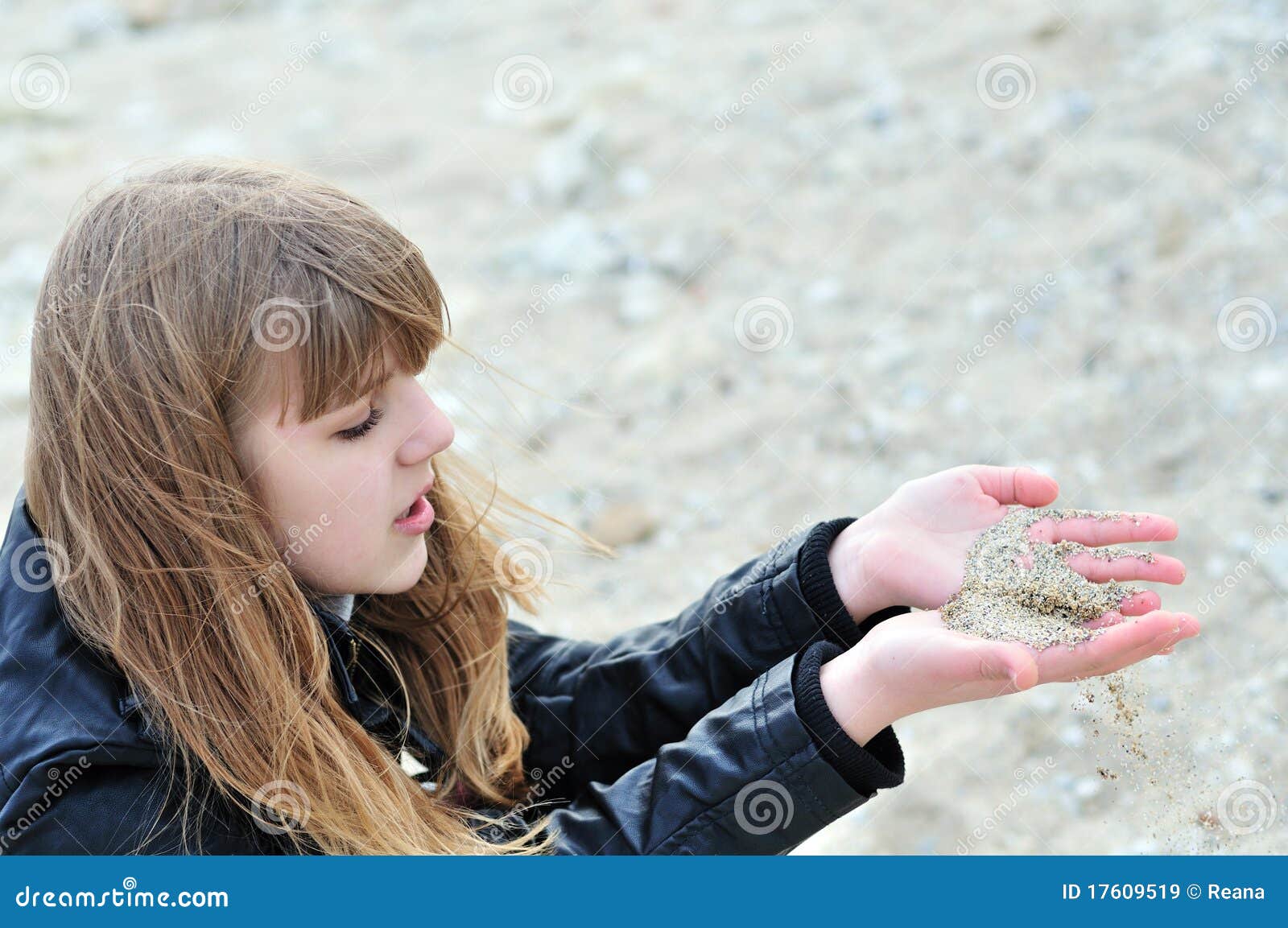 Sand slips through fingers stock image. Image of leisure 17609519
