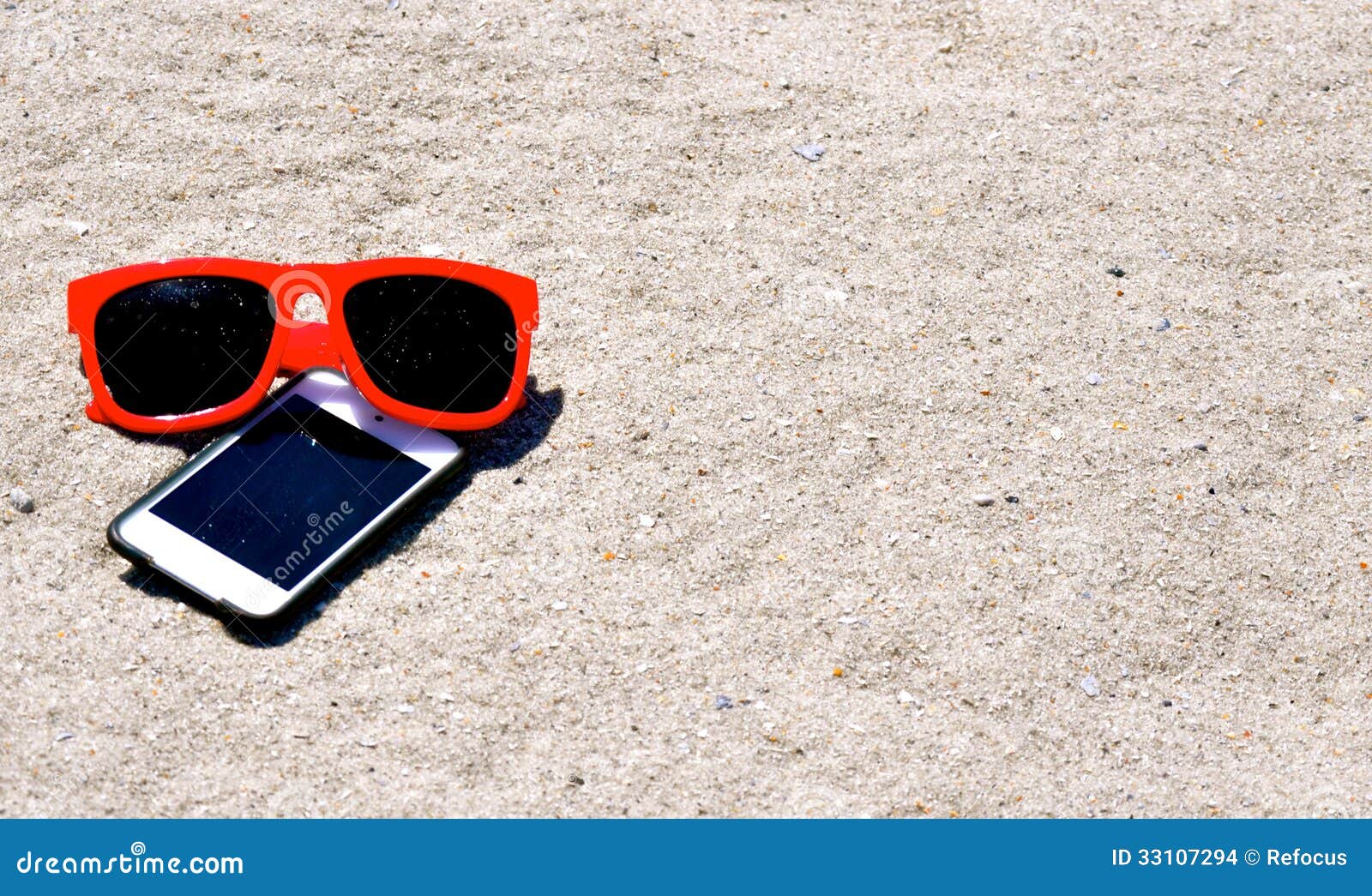 In the SandSunglasses IPod IPhone Stock Photo Image of phone, player