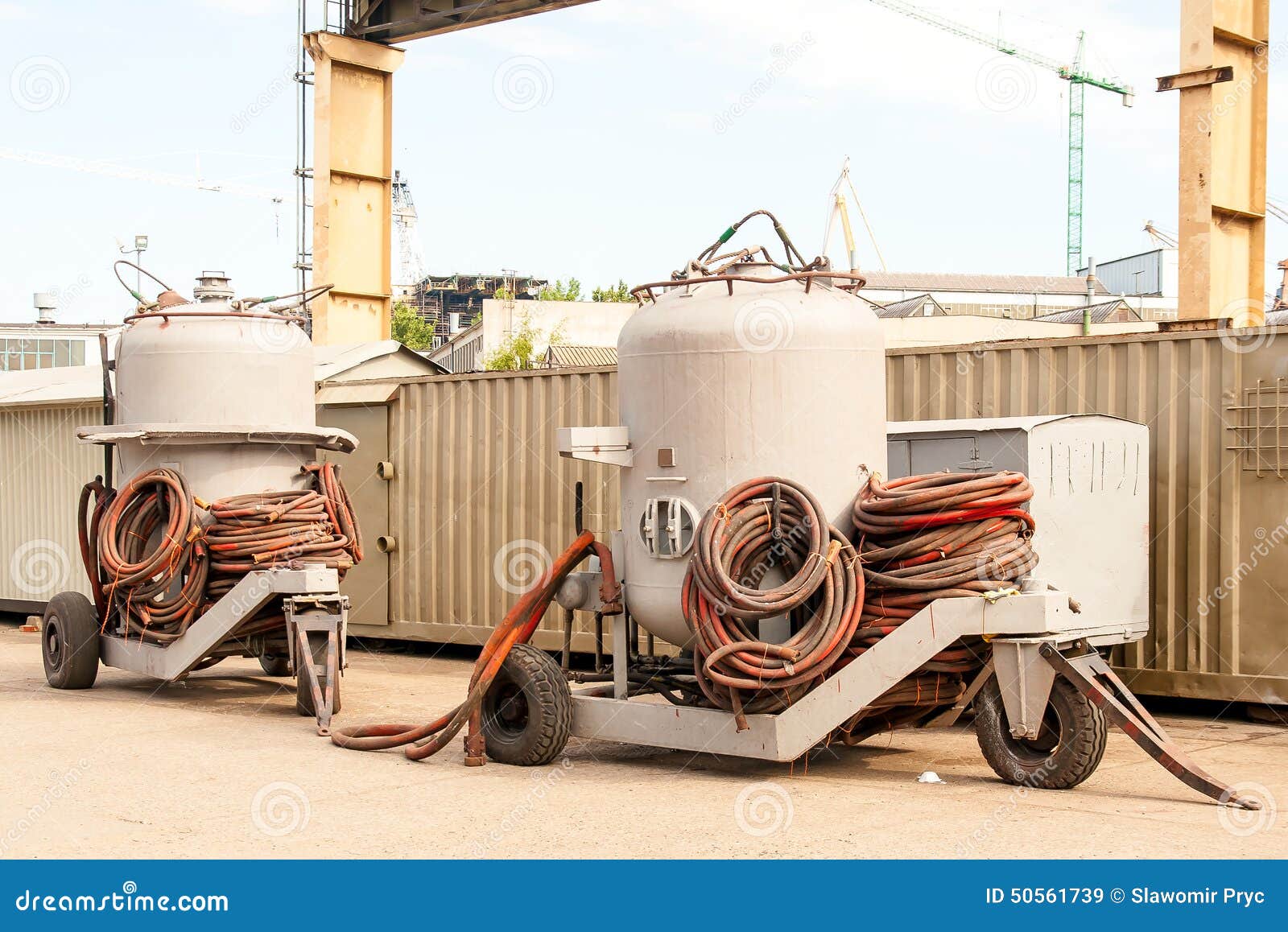 Sandblaster tanks stock image. Image of yard, shaft, hoses 50561739