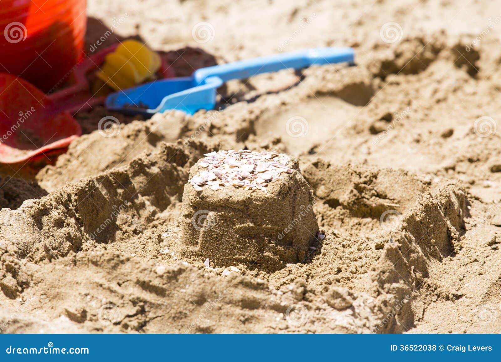 Sandcastle and toy tools stock photo. Image of summer 36522038