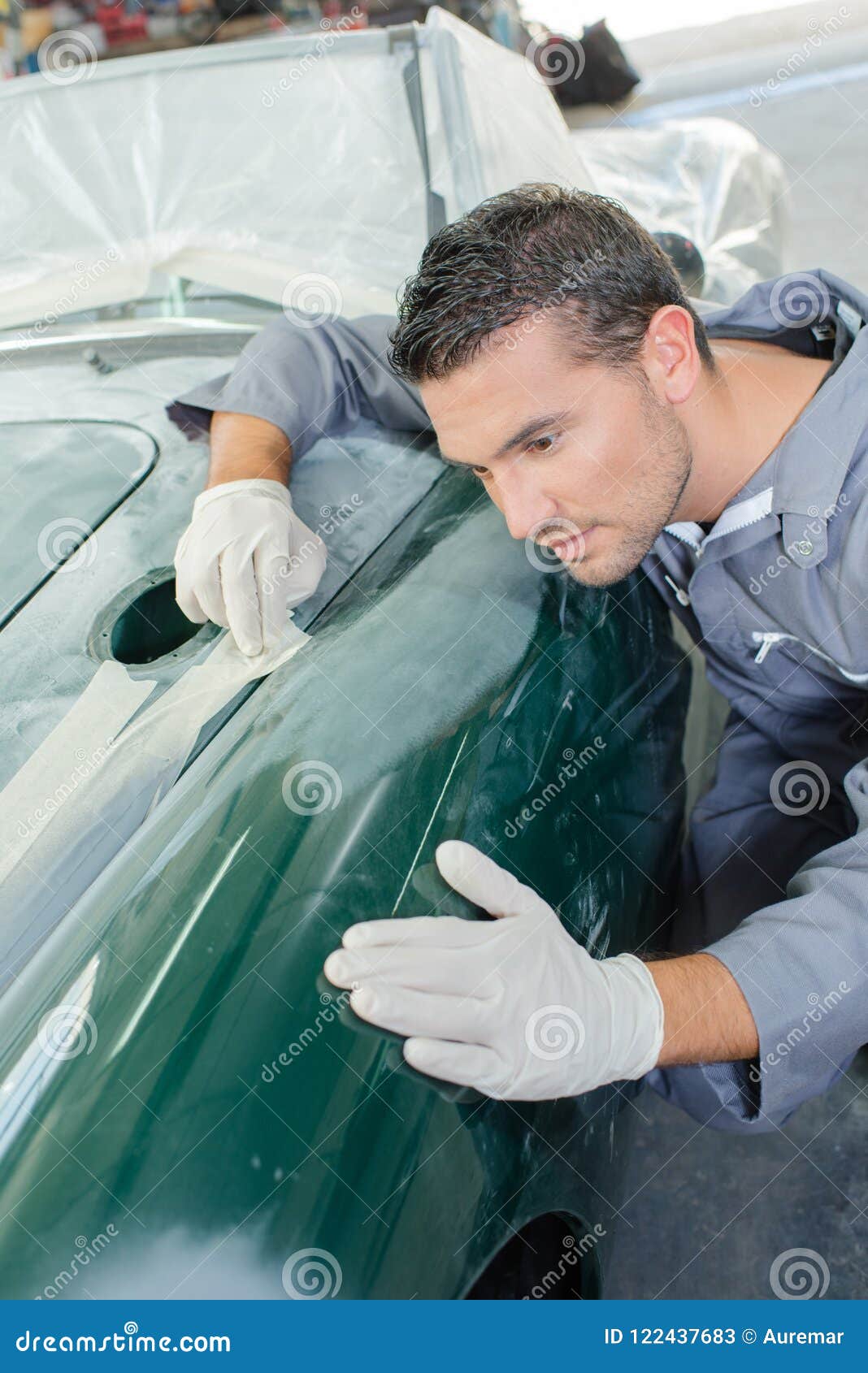 Sanding down a car stock image. Image of application 122437683