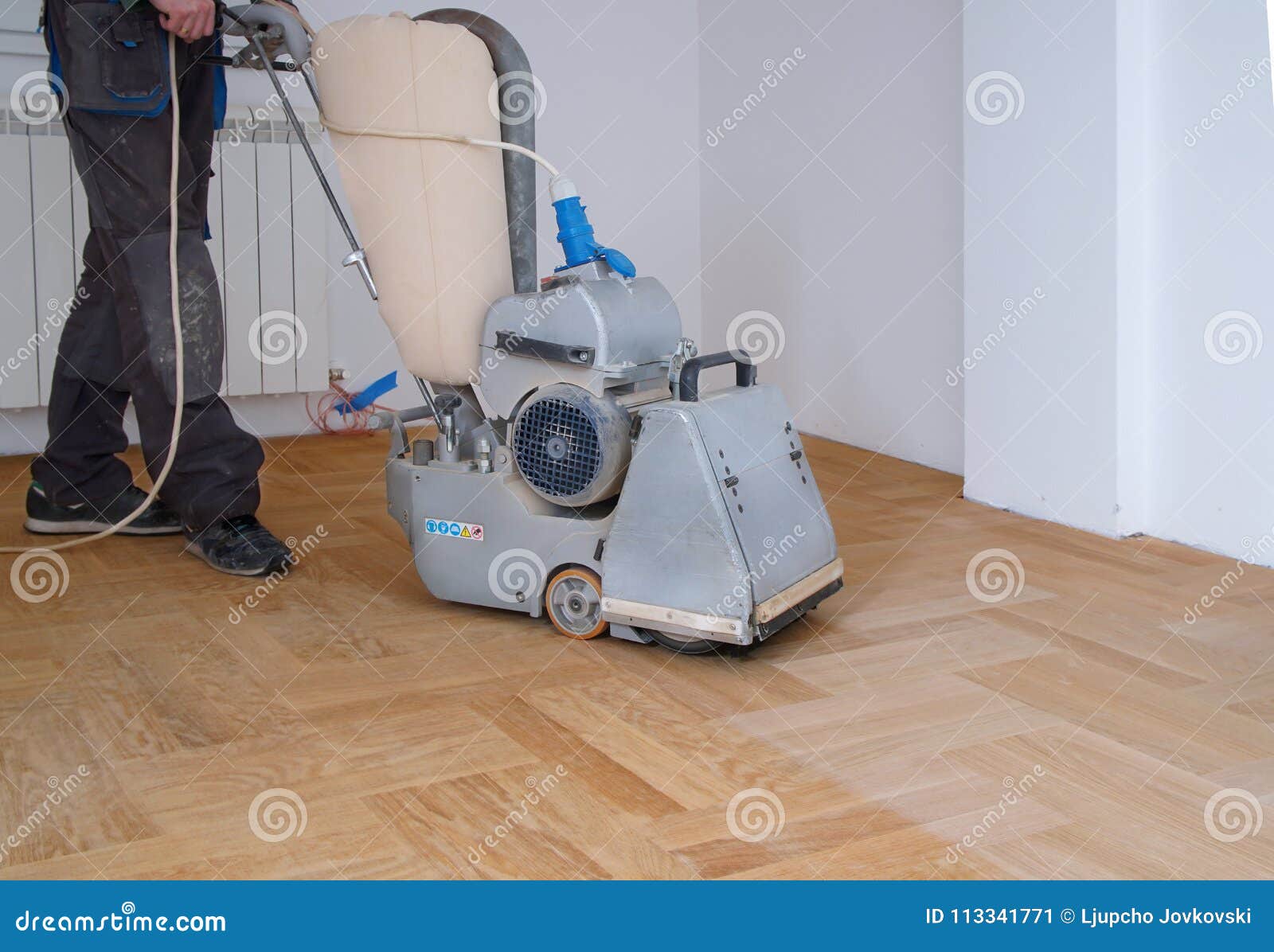 Sanding Hardwood Floor With The Grinding Machine Stock Image