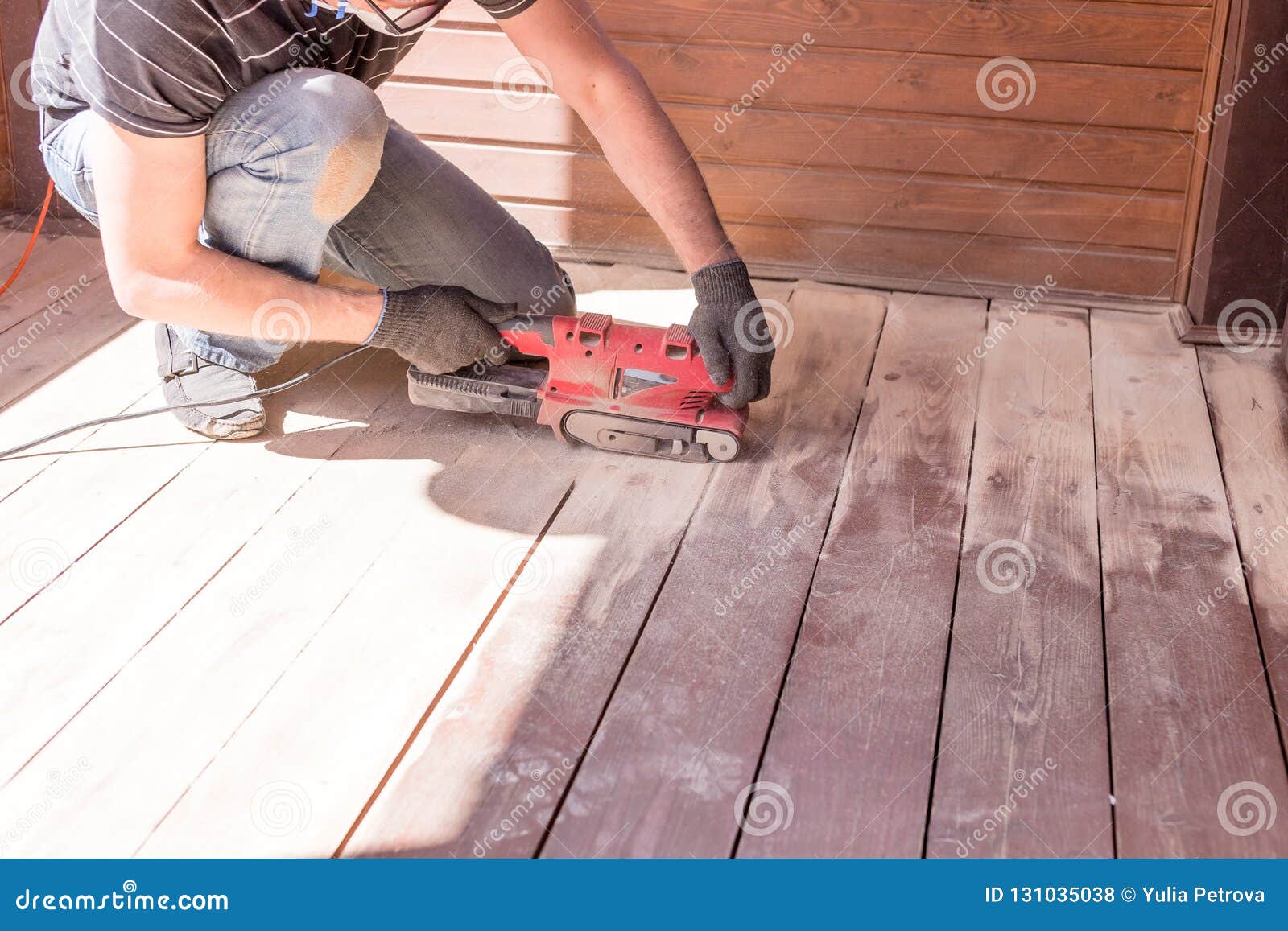 Sanding Hardwood Floor With The Grinding Machine Repair In The