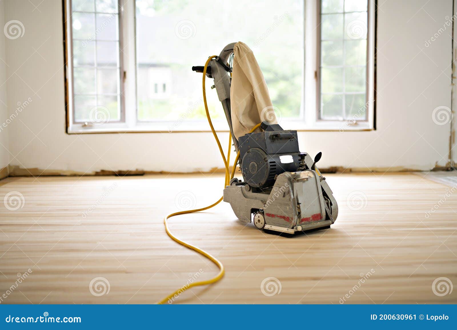 Sanding Hardwood Floor with the Grinding Machine only Tool Stock Image