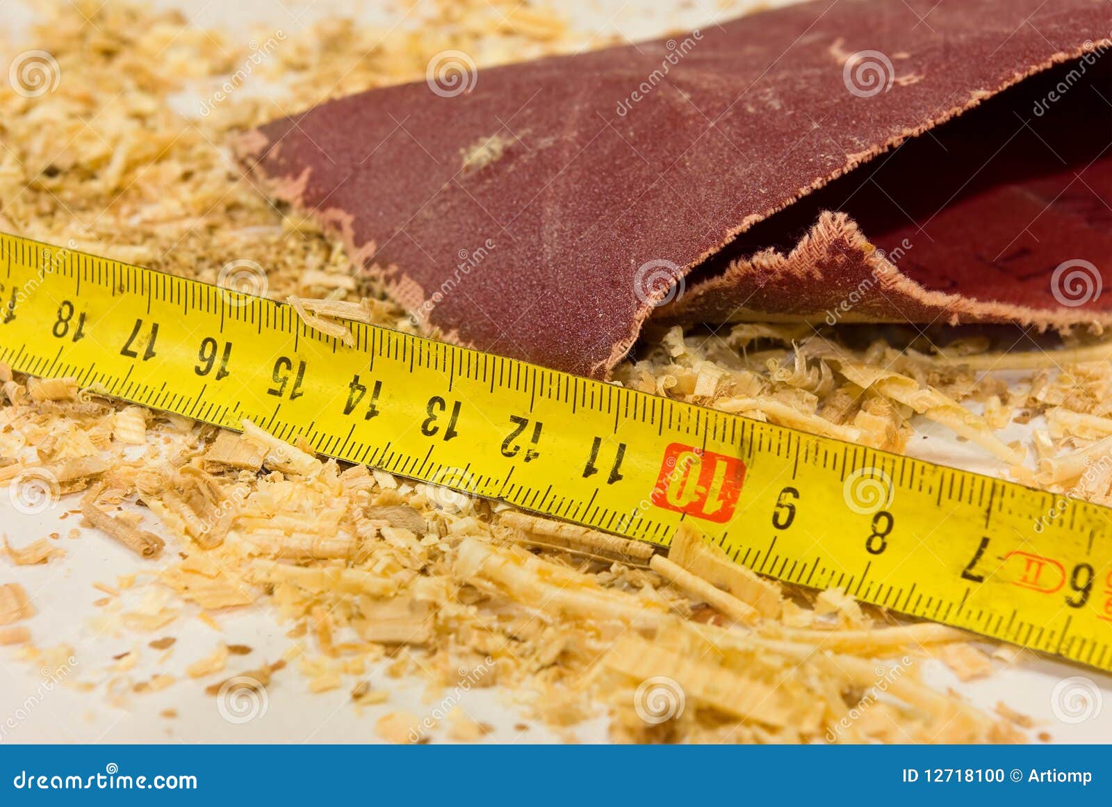 sandpaper, ruler and sawdust
