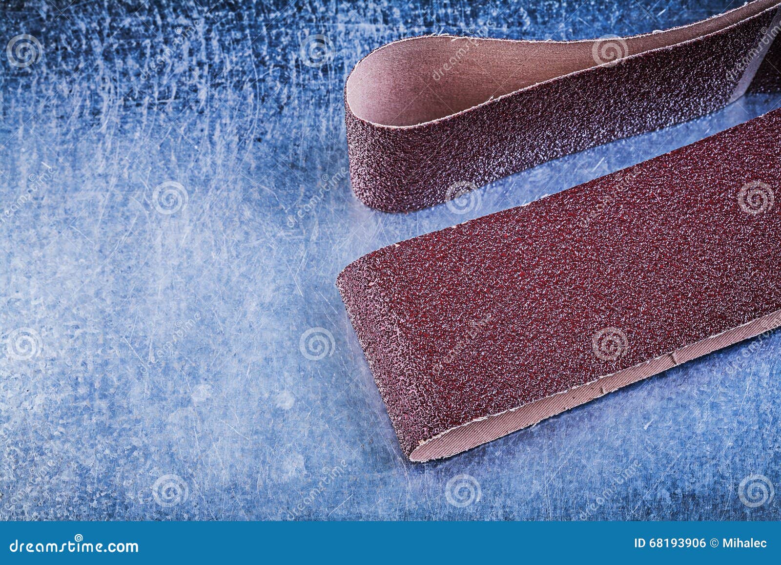 Sandpaper on Scratched Metallic Background Abrasive Materials Stock