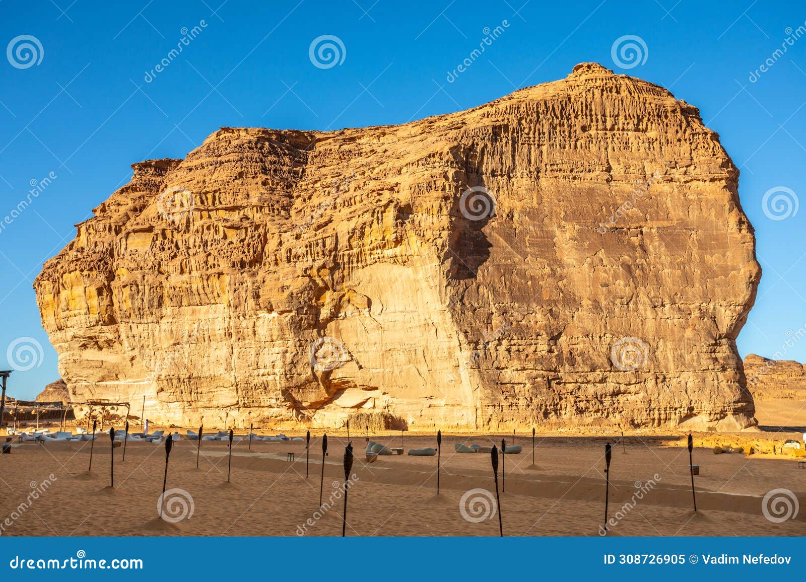 sandstone rock erosion monolith standing in the desert, al ula, saudi arabia